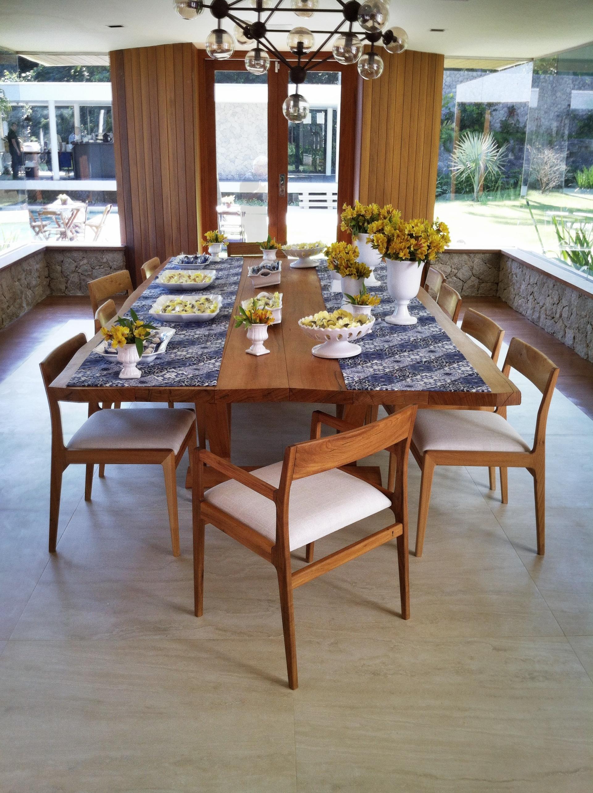 Contemporary dining table made with selected tropical Brazilian hardwood. Contemporary Brazilian design.

This dining table has a solid knock down tabletop and strong base assembled with traditional wood joints. It can be custom made.
