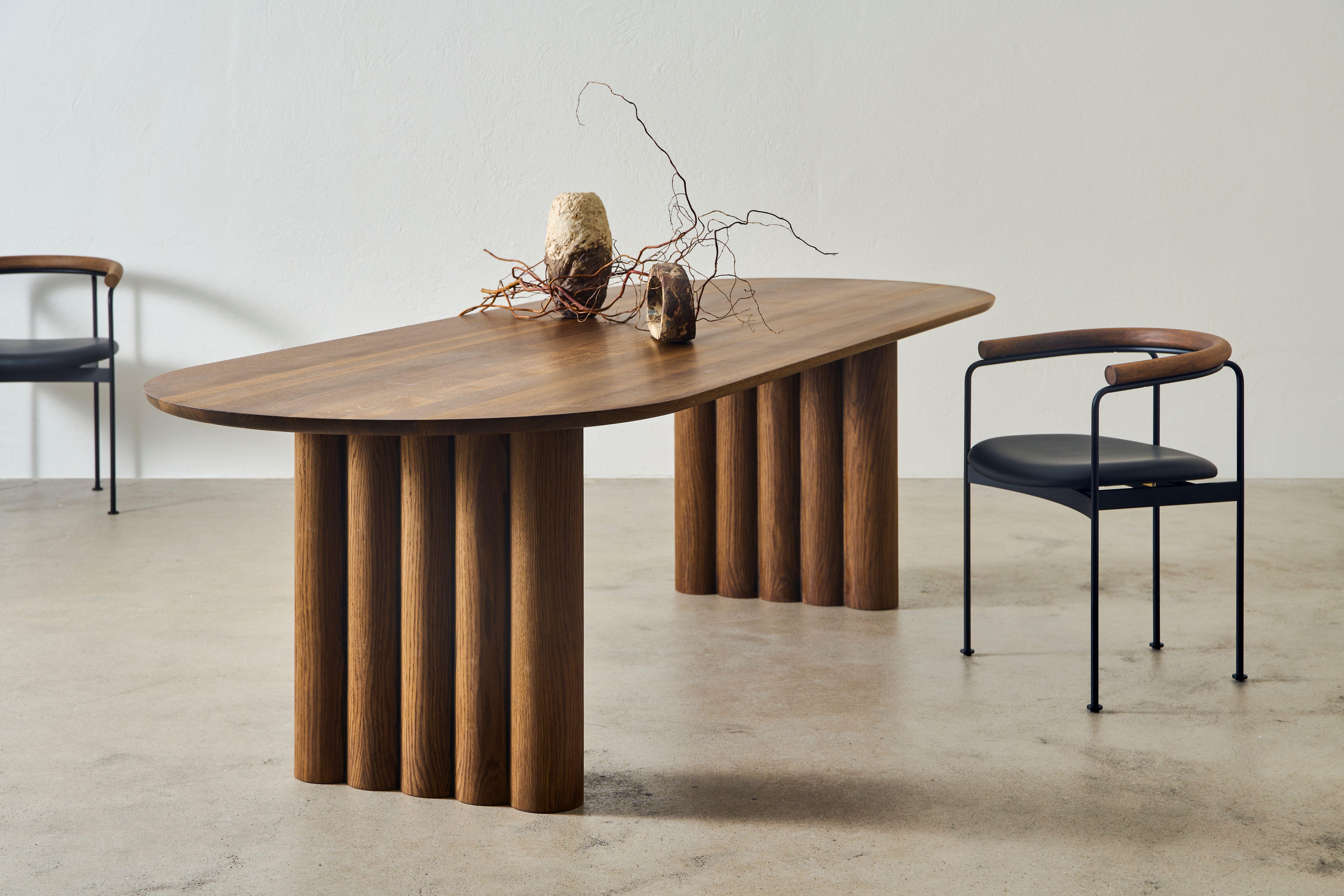 PLUSH dining table, oval, 200 cm.
Solid wood table top and legs. Handmade in Denmark. 
Signed by Jacob Plejdrup for DK3

Table's height: 72 or 74 cm
Table top’s thickness: 30 (in picture) or 40mm
Legs width: 130mm (in picture) or 150mm

Table top