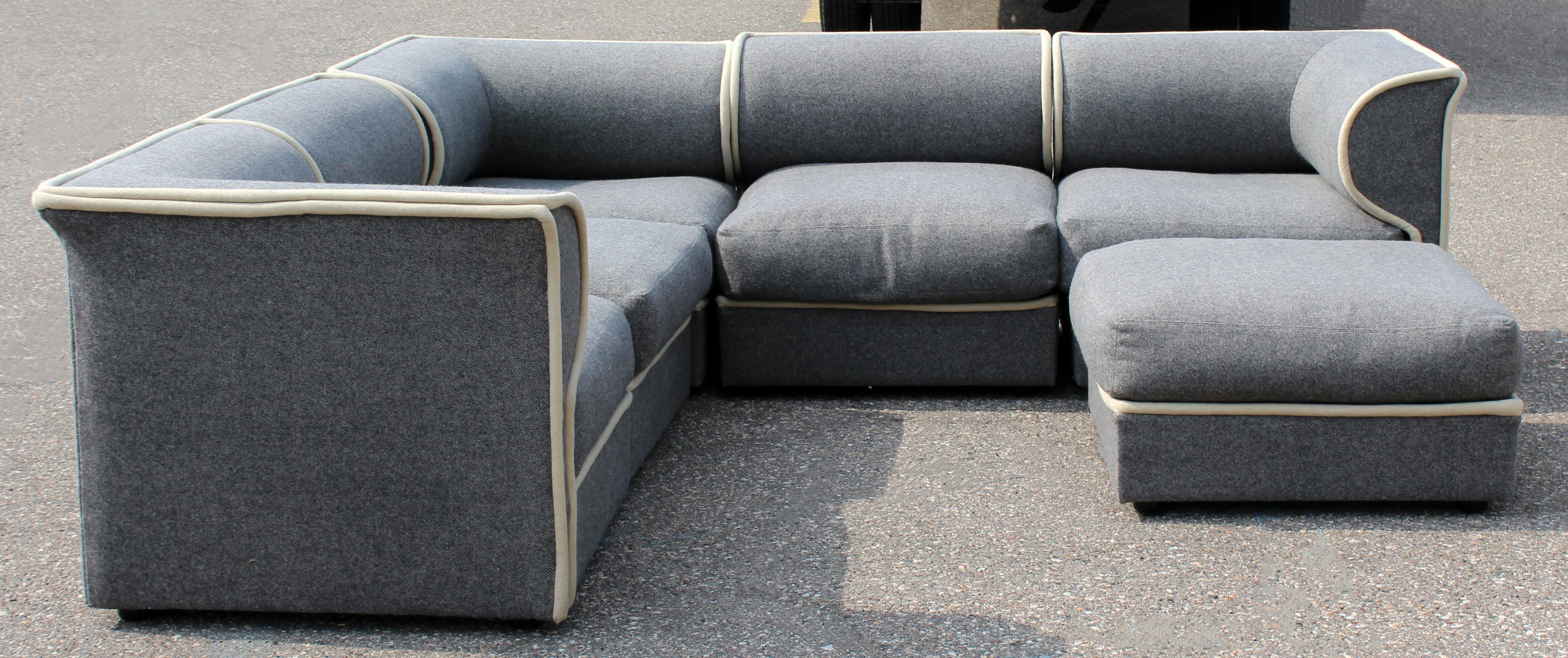 For your consideration is a phenomenal, five-piece, curved, modular sectional sofa in a dove gray wool blend upholstery, by Directional, circa 1990s. In excellent condition. The dimensions of each piece are 31.5