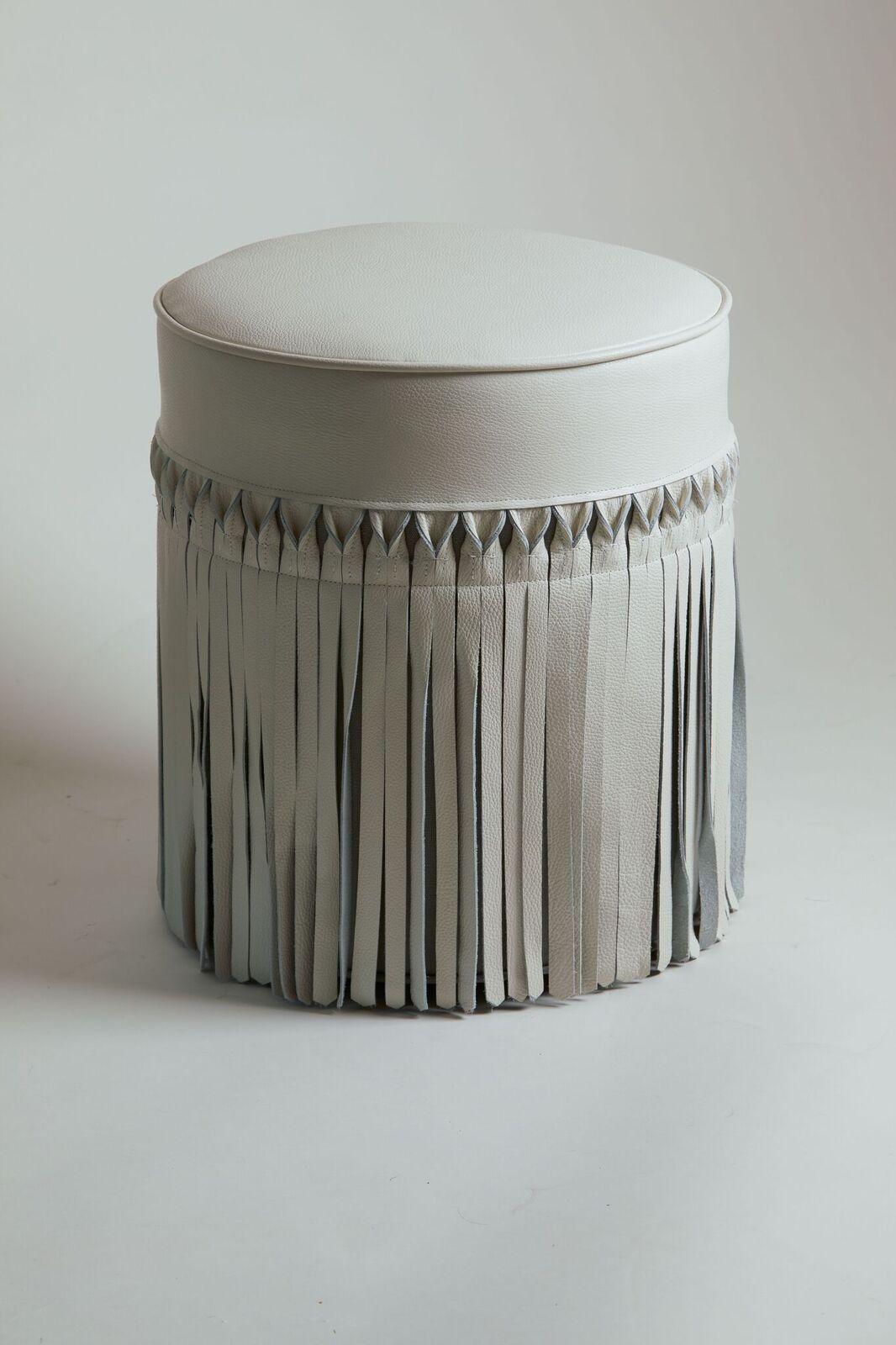 Contemporary domestic white leather fringe stool.