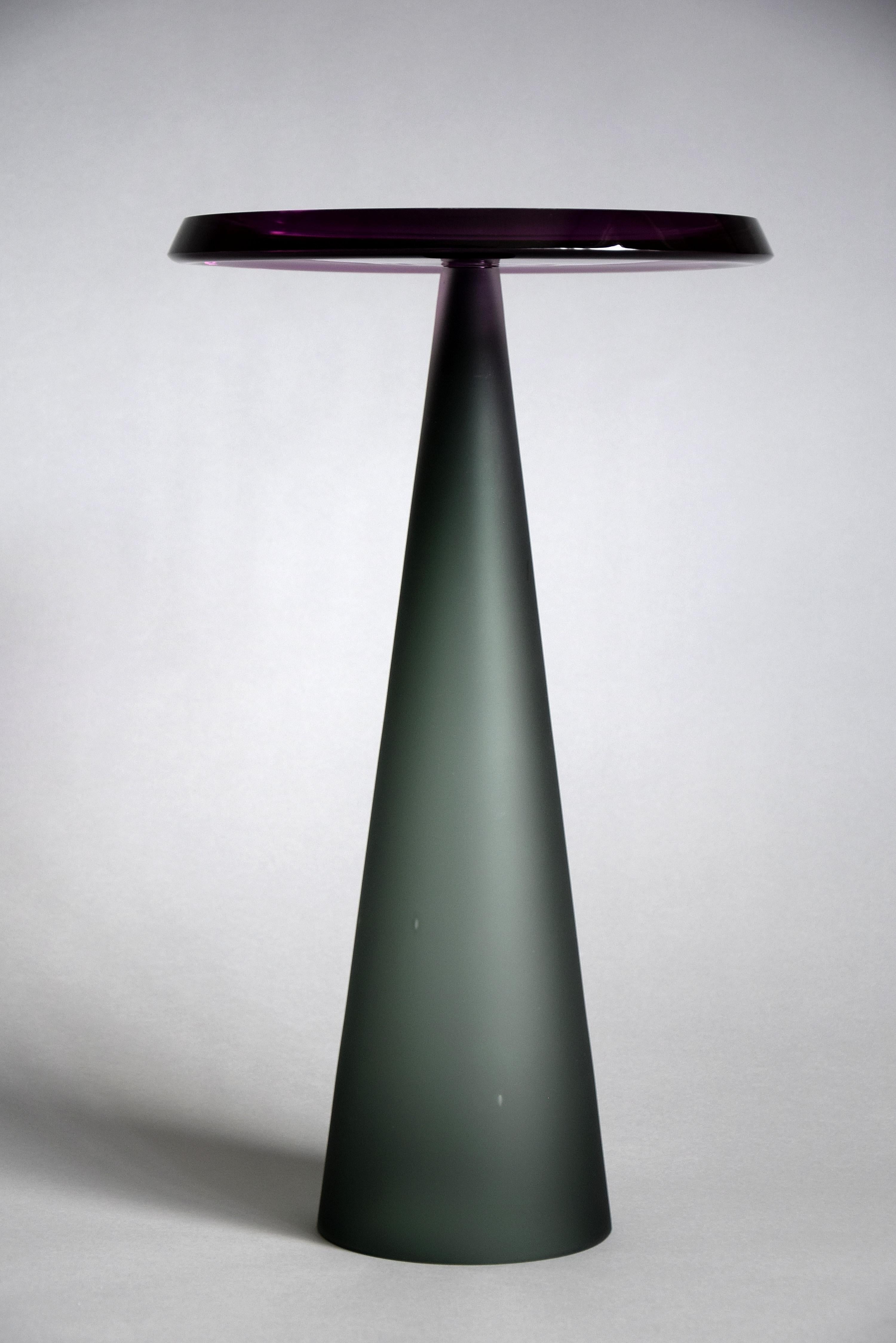 Stylish and elegant Dominio hand blown side tables. These beauties can be made in any color upon request but please note that because of the hand blown procedure the color will vary. Also due to the hand blowing, hand cutting and hand polishing