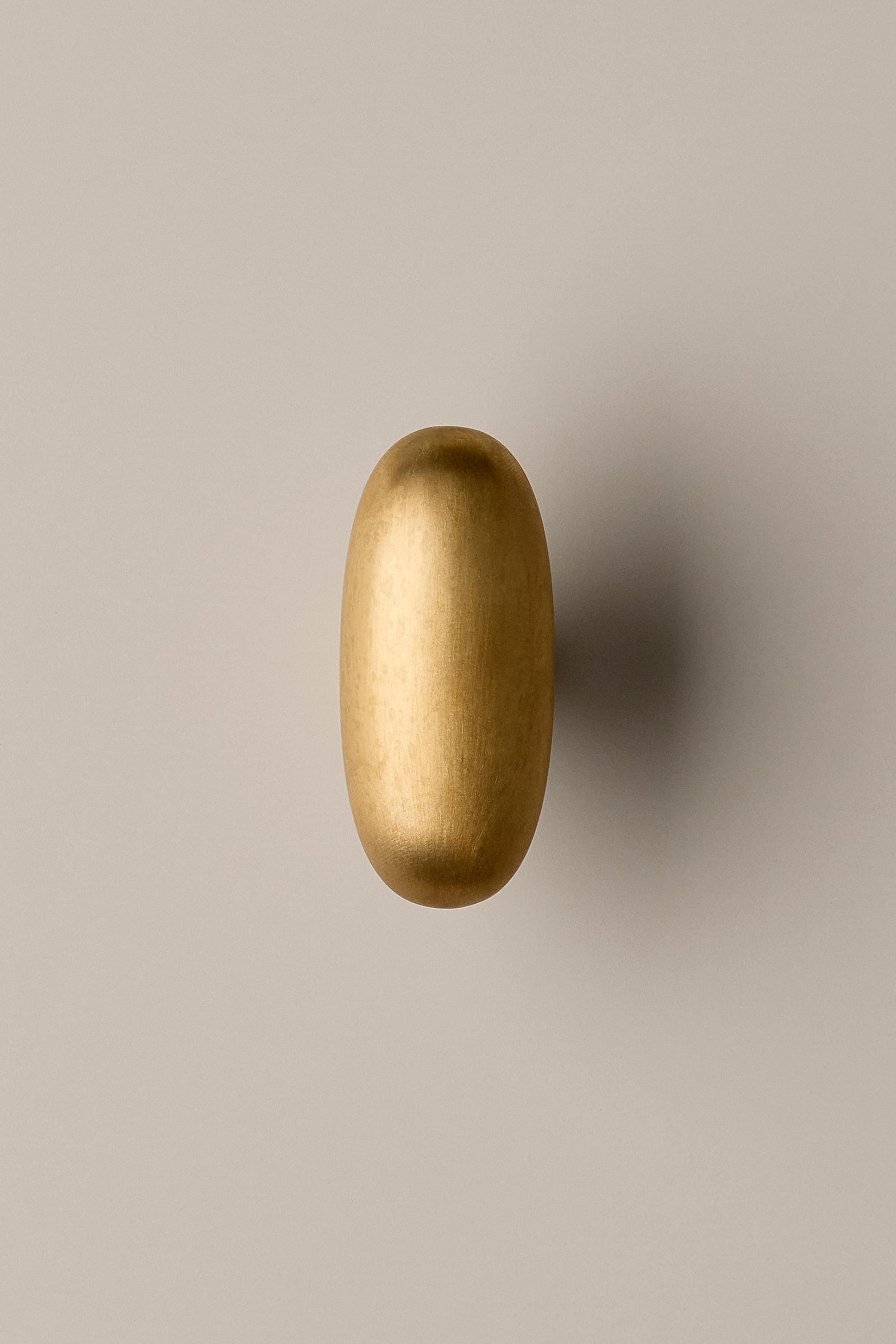 Door Handle / Knob 'Blunt' by Spaces Within, Amber Brass

Dimensions mm: 40 x 20 x 32
Weight: 98 g

A harmoniously balanced oval, BLUNT is pure, essential and confident. A classical yet refined knob with a sense of ease that will suit many spaces.