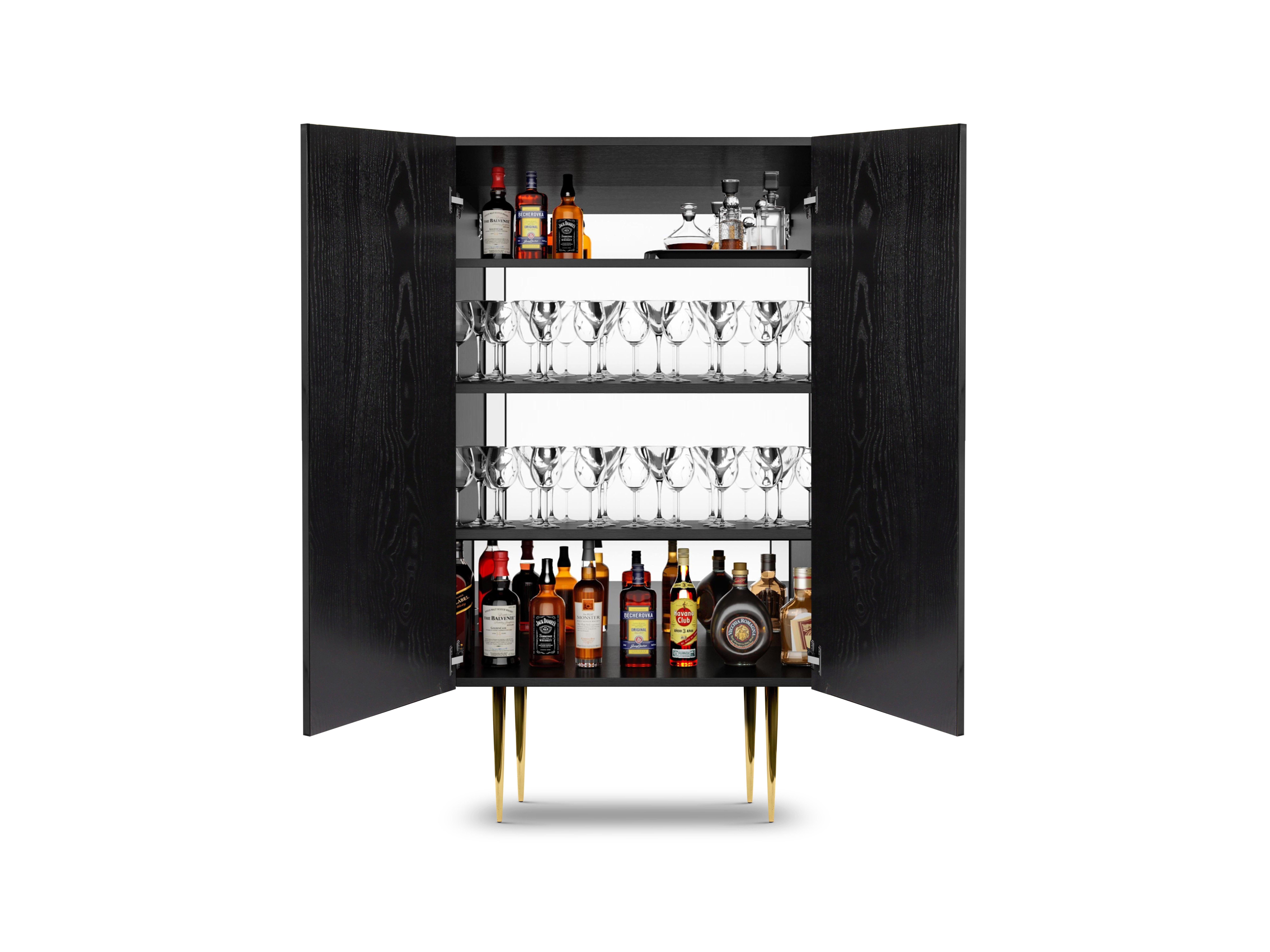 Introducing Minerva, the ultimate statement piece for art lovers who appreciate fine craftsmanship and functional design. Crafted from premium ash veneers and brass, this drink cabinet exudes elegance and sophistication, making it the perfect