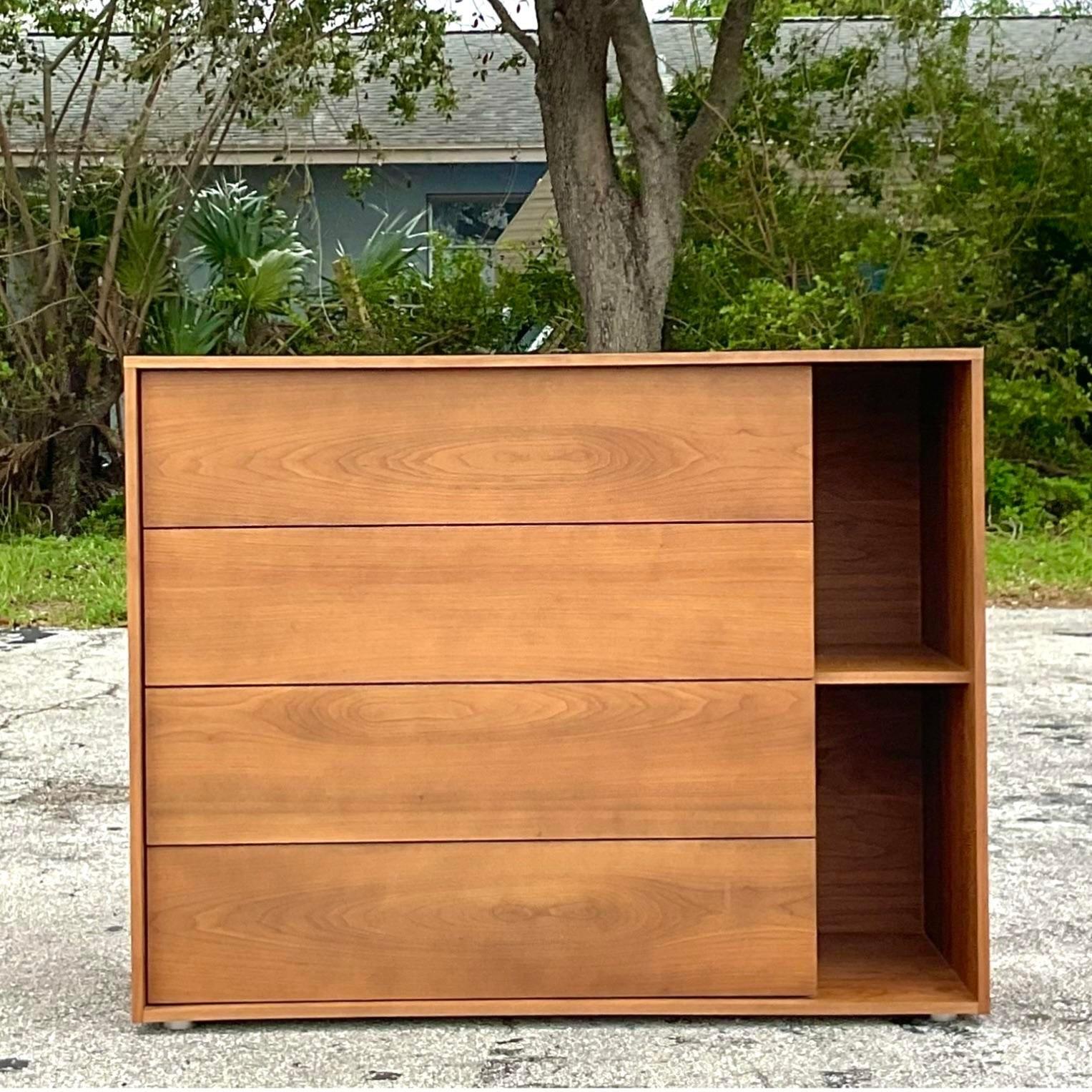 A fabulous vintage a contemporary four drawer dresser. Made by the DWR group and tagged inside the drawer. Acquired from a Palm Beach estate. 
