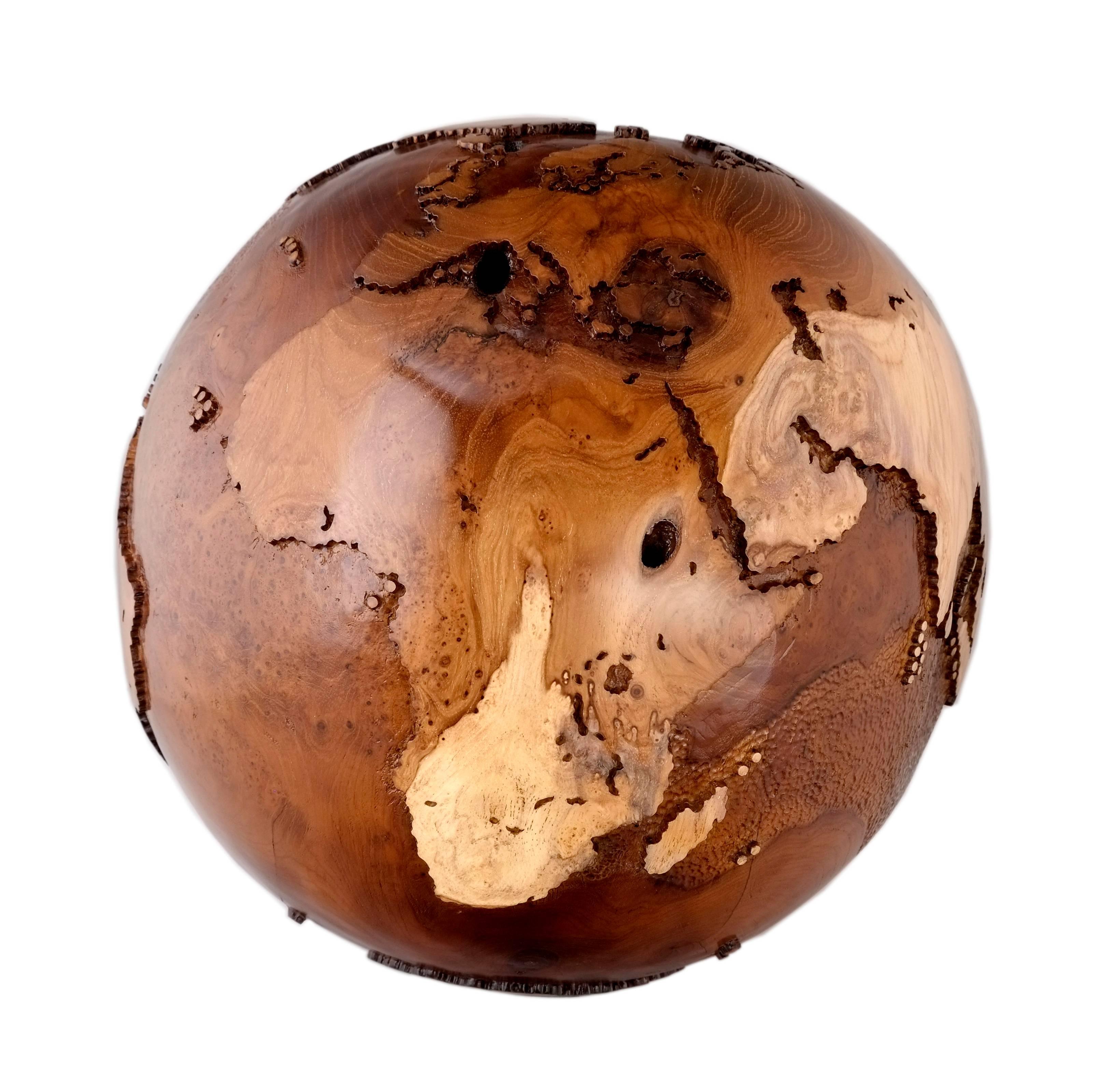 Your vibe speaks volume louder than any words could ever speak.

Eclat Vibe, hand-carved wooden globe with a burst of interesting patterns throughout the piece;
It has natural burl with swirls, eyes, and twirls that create a unique, highly