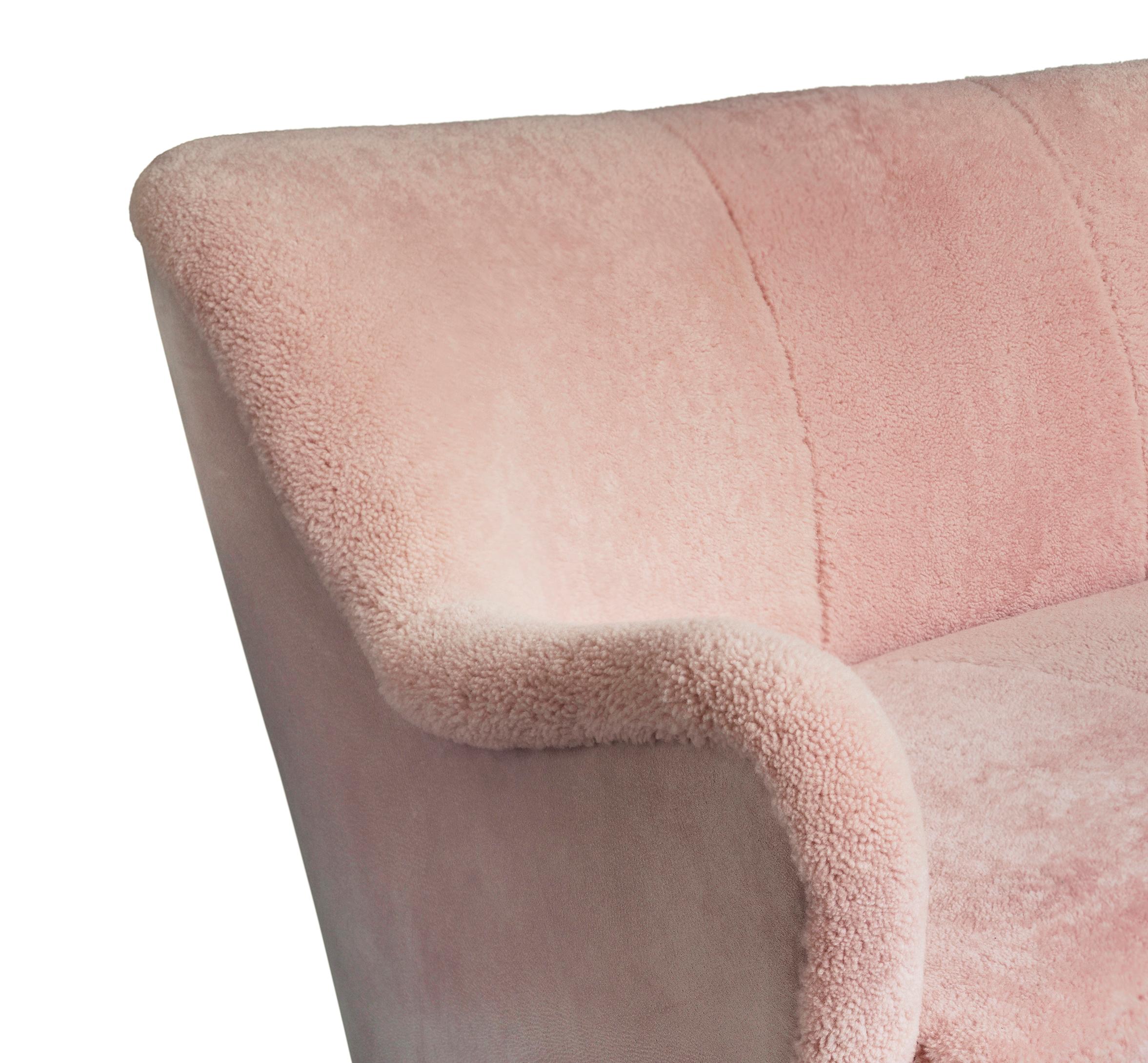 curved pink sofa