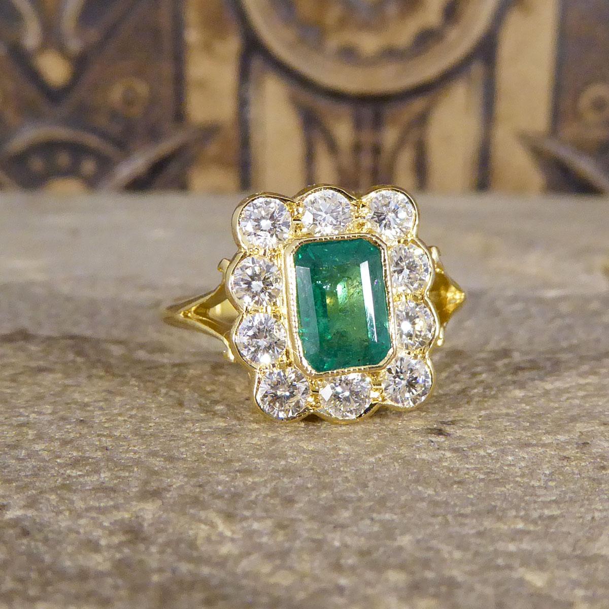 This beautiful Contemporary Emerald and Diamond ring would make the perfect engagement or statement ring. It has been crafted to reflect an Edwardian style Ring, with one single 0.90ct Emerald Cut Emerald with natural flaws in the stone making it