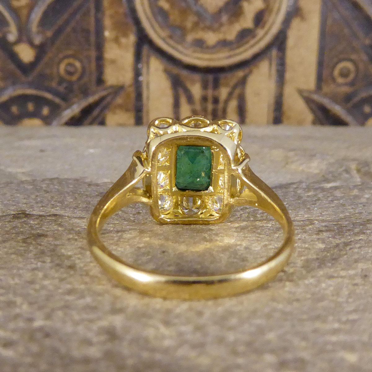 Contemporary Edwardian Style 0.90ct Emerald & Diamond Cluster Ring in 18ct Gold In Excellent Condition For Sale In Yorkshire, West Yorkshire