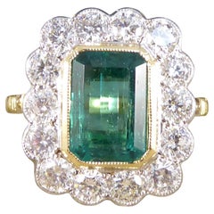Contemporary Edwardian Style 2.50ct Emerald and Diamond Cluster Ring in Gold