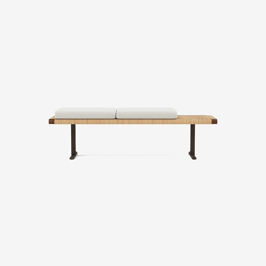 'El Raval' Bench by Man of Parts
Signed by Yabu Pushelberg

Dimensions: H. 45 x 48 x 153 cm / Seat height: 45 cm
Available in various fabrics / COM available
Frame in walnut stained solid ash and rattan 

Model shown: Rohi Opera col. Calla