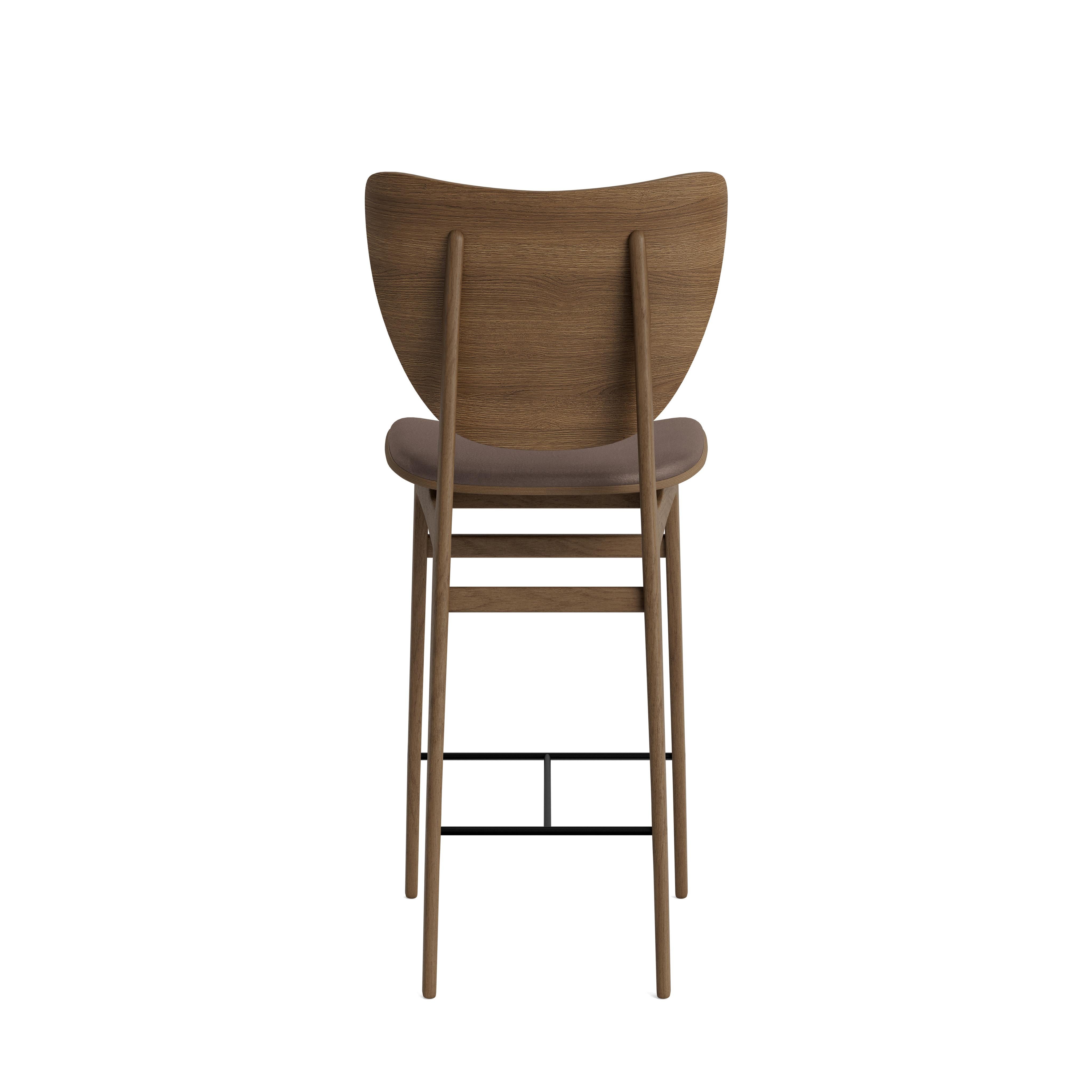 Elephant Bar Chair
Signed by Rune Krøjgaard & Knut Bendik Humlevik for Norr11. 

Dimensions: H. 101 cm x W. 46 cm x 52 cm SH. 65 cm

Model shown on the picture:
Wood: Light Smoked oak
Fabric: Leather Dunes Dark brown 21001

Wood types