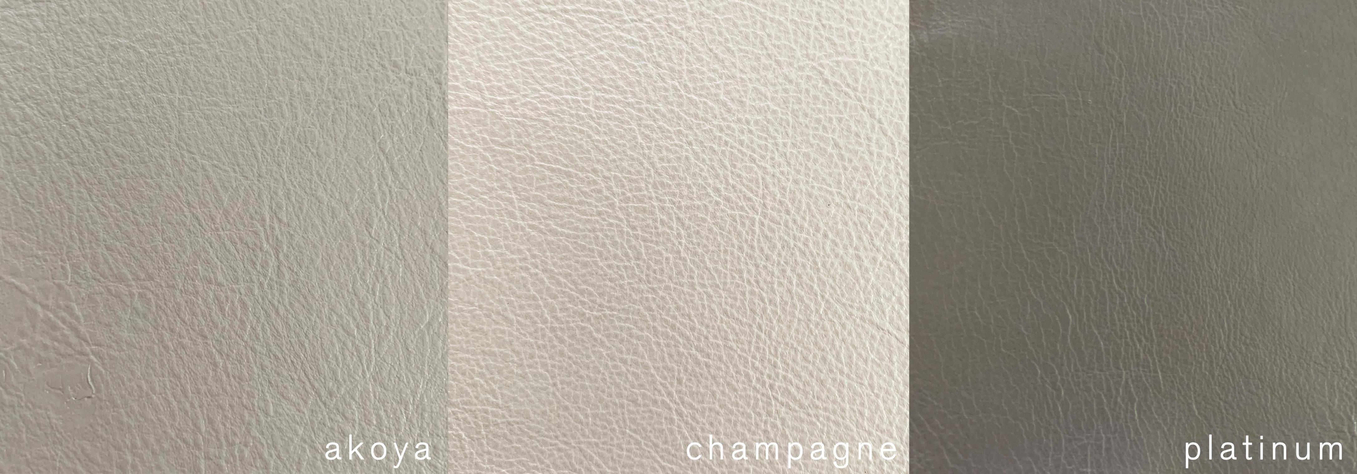 Zeitgenössischer Elodie-Esszimmerstuhl aus champagnerfarbenem, perlmuttfarbenem Leder mit Nussbaumbeinen (Ebonisiert) im Angebot