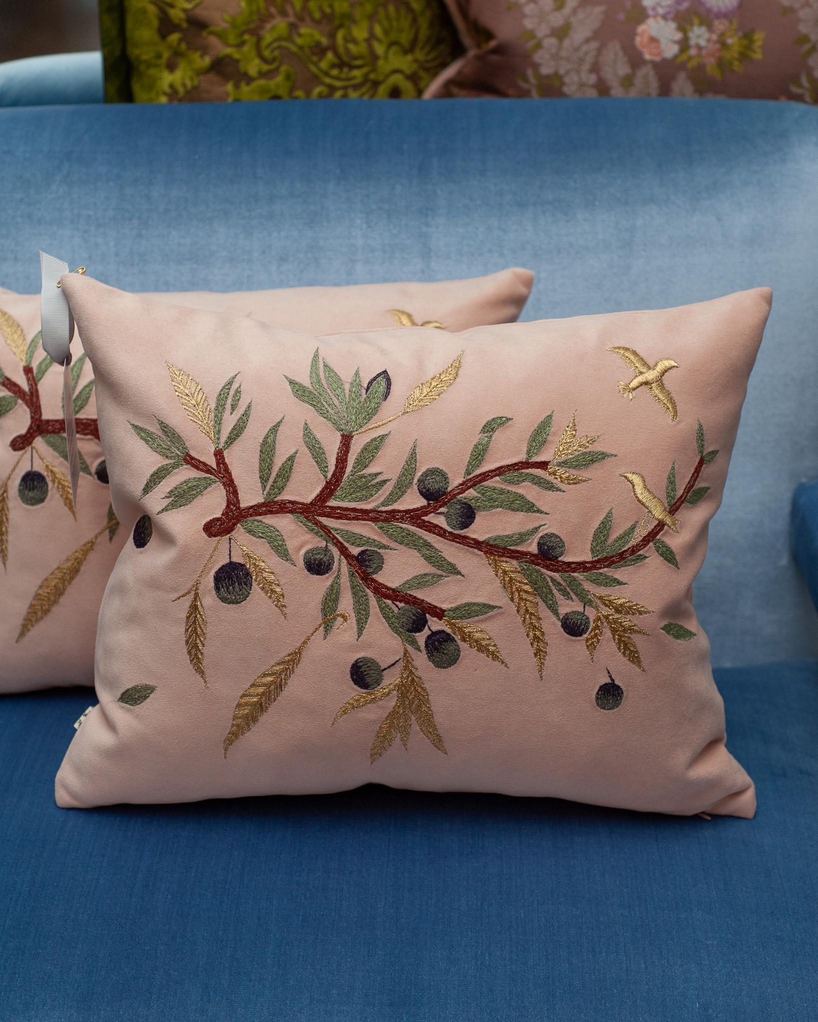 A beautiful embroidered pillow with dove and olive branch motif, ornately embroidered in a combination of coloured and metallic thread on an ultrasuede backing. Casual yet elegant, a new pair of pillows can transform a space with a modest