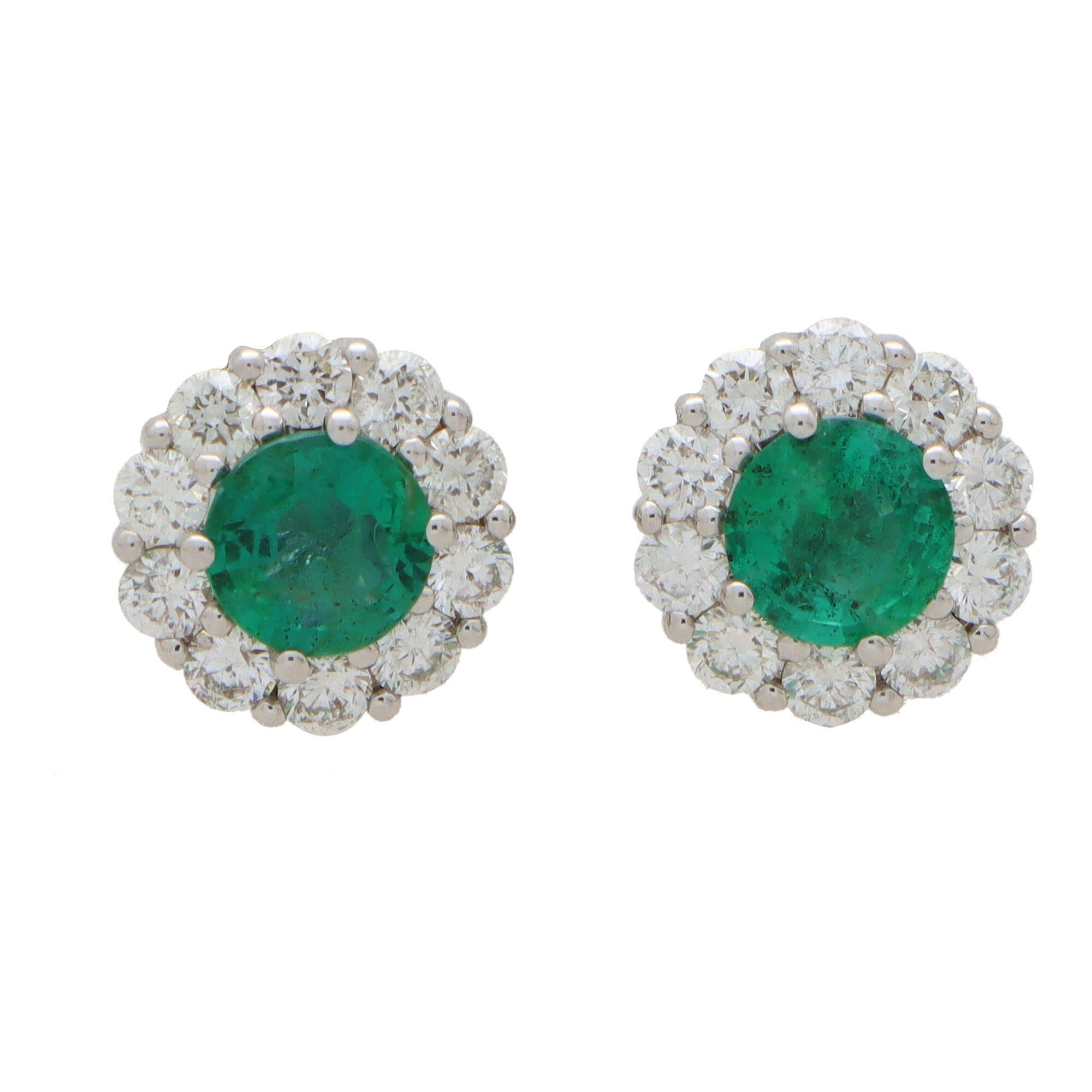 Round Cut Contemporary Emerald and Diamond Cluster Earrings in 18k White Gold For Sale
