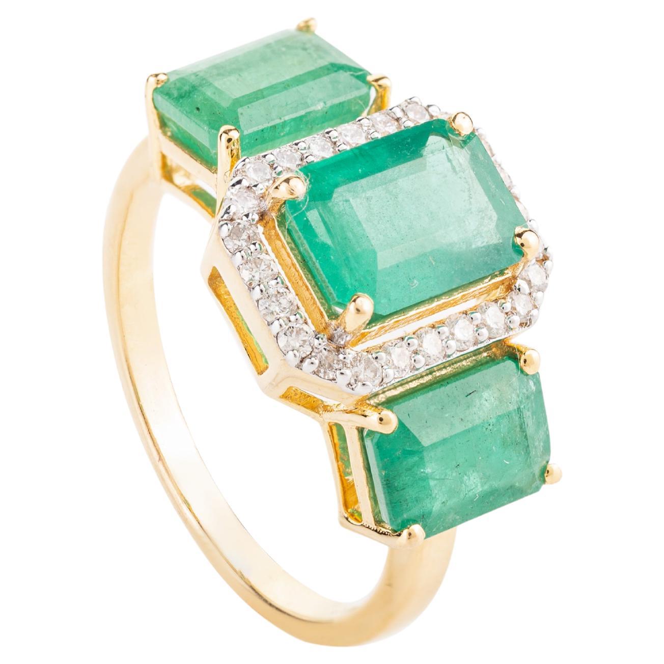 For Sale:  Contemporary Emerald Three Stone 18k Yellow Gold Ring with Halo Diamonds