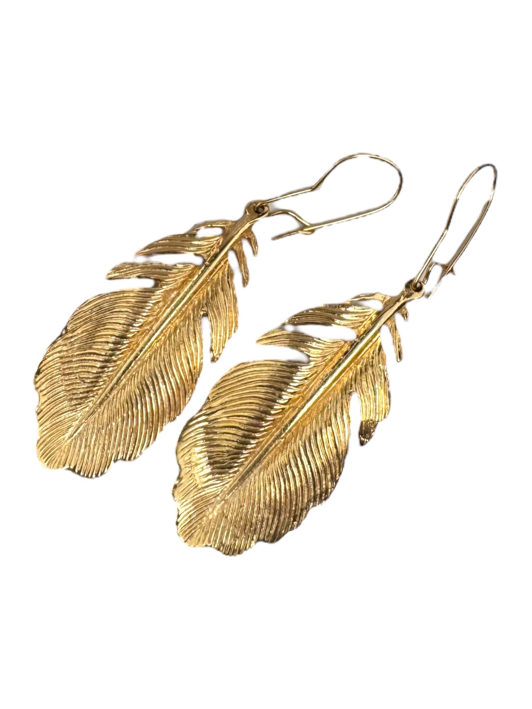 These magnificent earrings have so much detail!
Each feather is beautifully engraved!!

Earring Details: 
Metal: 14K Yellow Gold
Weight: 11.6 Grams
Feather Size: 1.5” X 0.75”
Total Drop Off Ear: 2”

Matching Necklace Currently Available

Item: