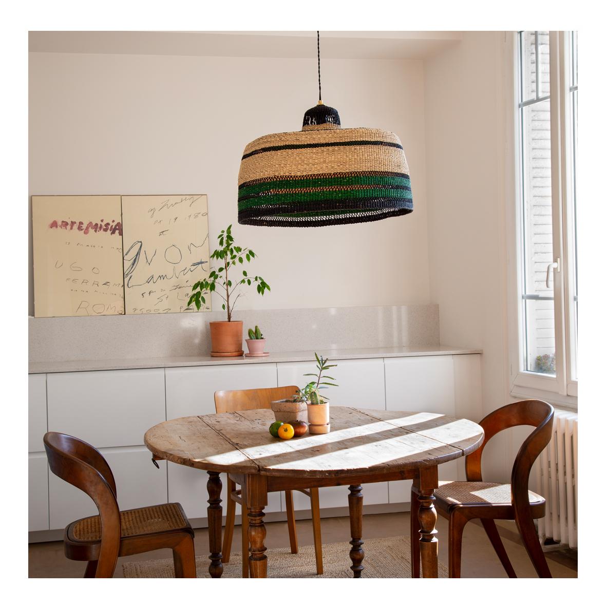 Large woven pendant lamp : 
Warm and earthy
Colour: Bottle Green

Do you love handmade objects but are looking for something more elevated to hang in your room? This large pendant lamp with black, bottle green and natural stripes will fill your