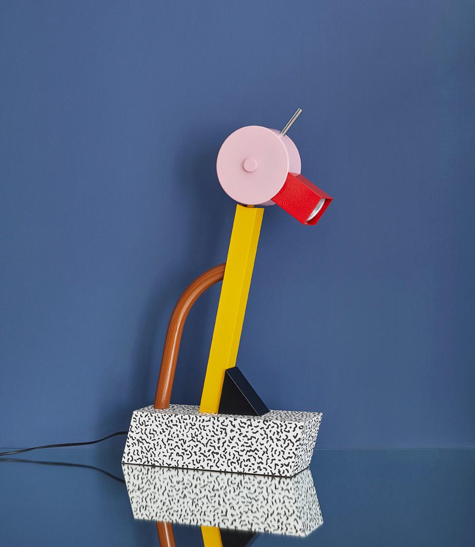 Ettore Sottsass
Italy, Contemporary. Tahiti lamp, designed in 1981. 

Polychrome enameled metal “duck” with pivoting head mounted on a black and white bacterio-patterned laminate base.

New production of the “Tahiti” table lamp designed by Ettore