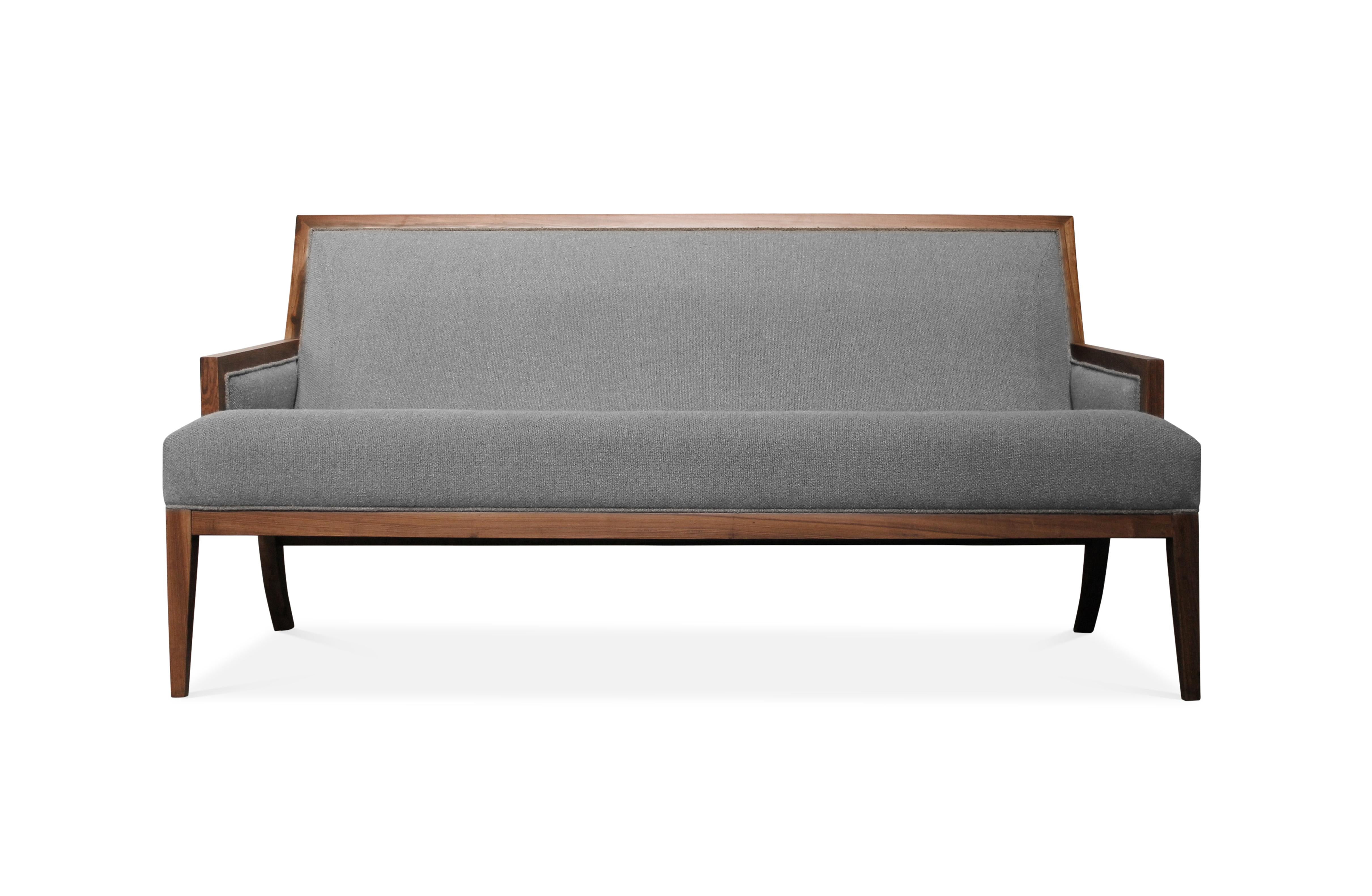 The Belgrano Settee is inspired by mid-twentieth century modernist design and features an ergonomic backrest. It can be customized into any size. Shown in Argentine Rosewood and C.O.L. but available in any finish or upholstery