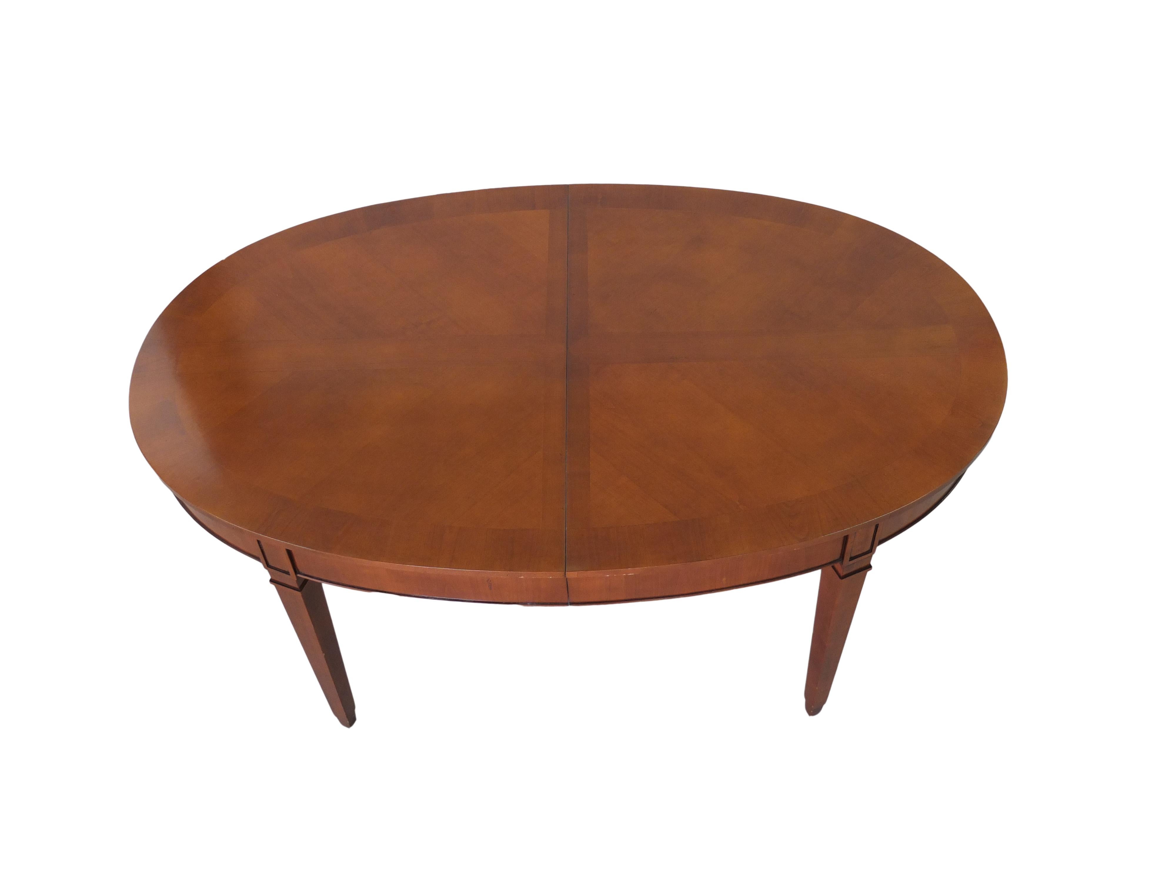 Contemporary oval extendable table in Direttorio style, made of cherrywood.
Precious inlay on the top.
Dimension: L 180 W 110 H 78 cm
dimension open: L 330 W 110 H 78.

      