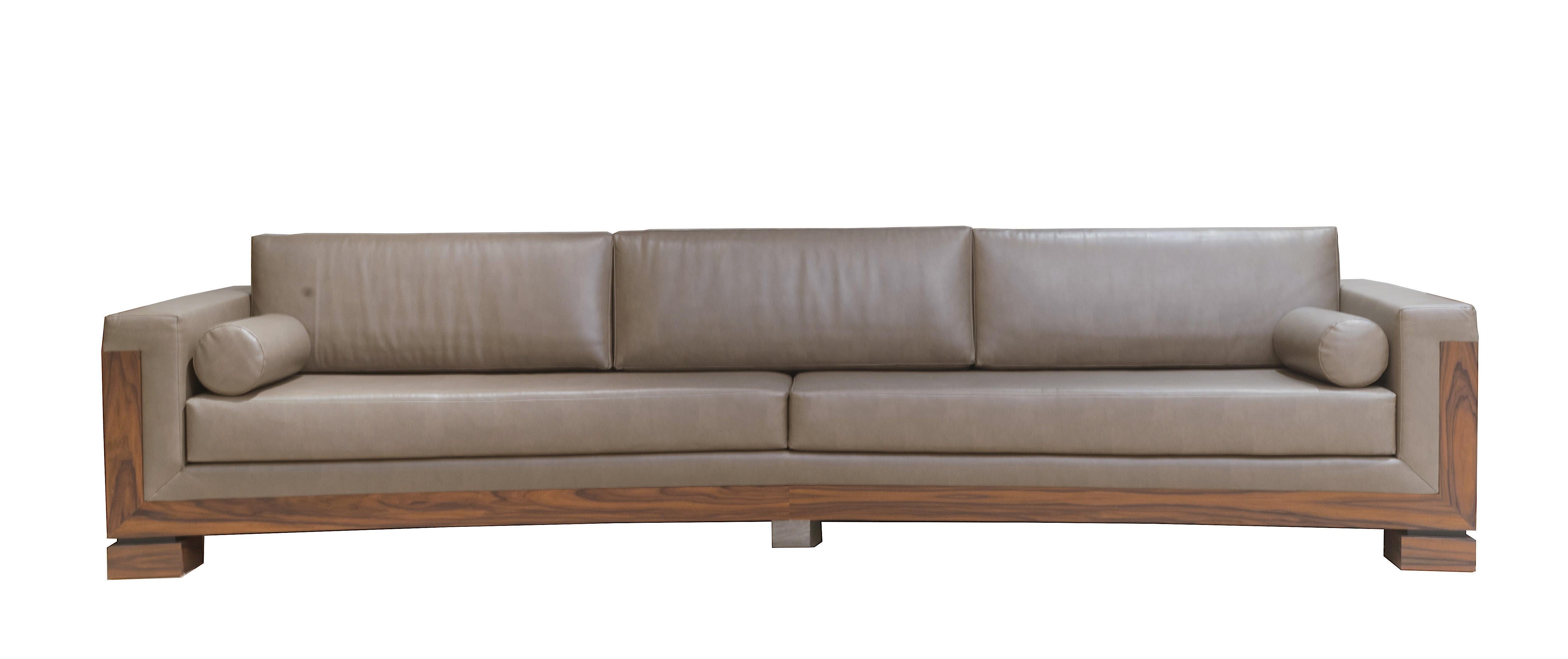 Contemporary extra long sofa (11.5' wide) with taupe leather cushions and a polished dark wood frame and matching leather pillows (2 Matching armchairs: 062056)
