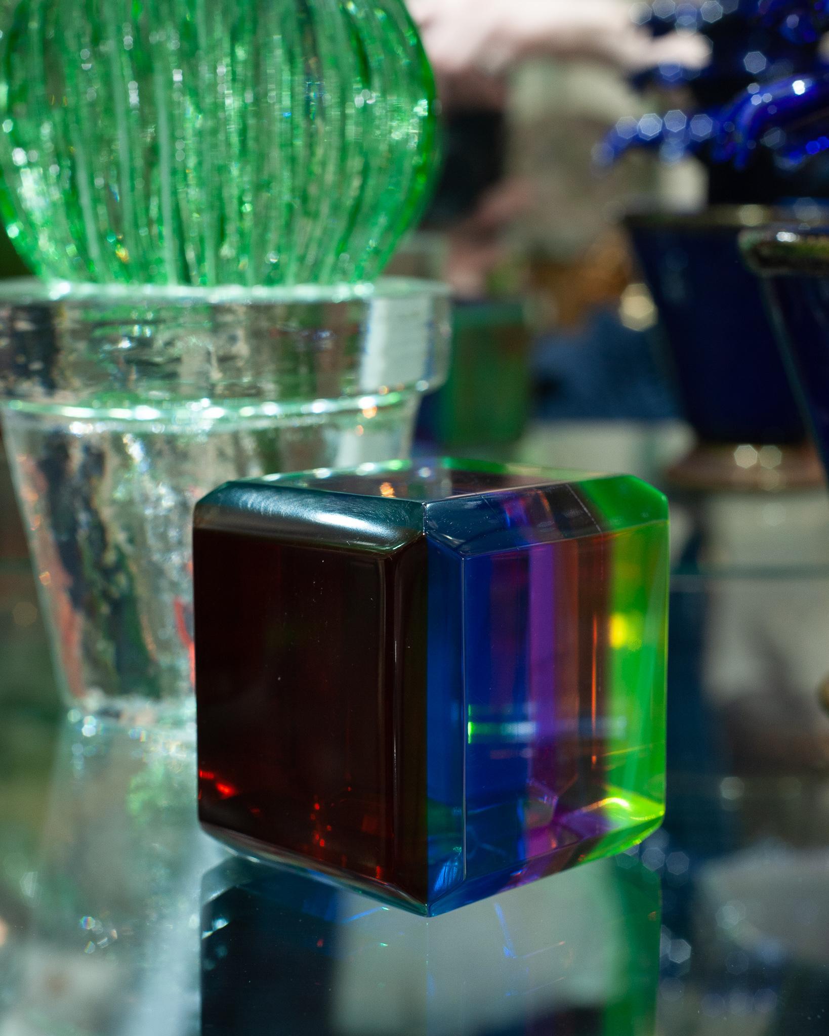 A stunning contemporary multicoloured acrylic block. A perfect riser for a small sculpture or a statement on its own on the table or desk, this beautiful block will reveal different tones and hues of colour from each angle it’s viewed from.