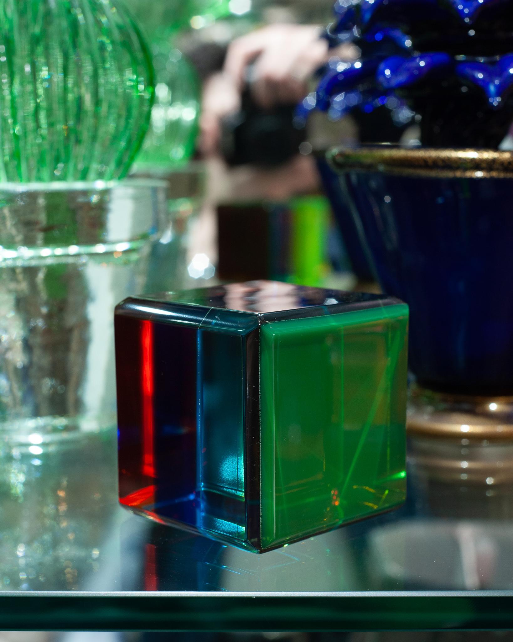A stunning contemporary multicoloured acrylic block. A perfect riser for a small sculpture or a statement on its own on the table or desk, this beautiful block will reveal different tones and hues of colour from each angle it’s viewed from.