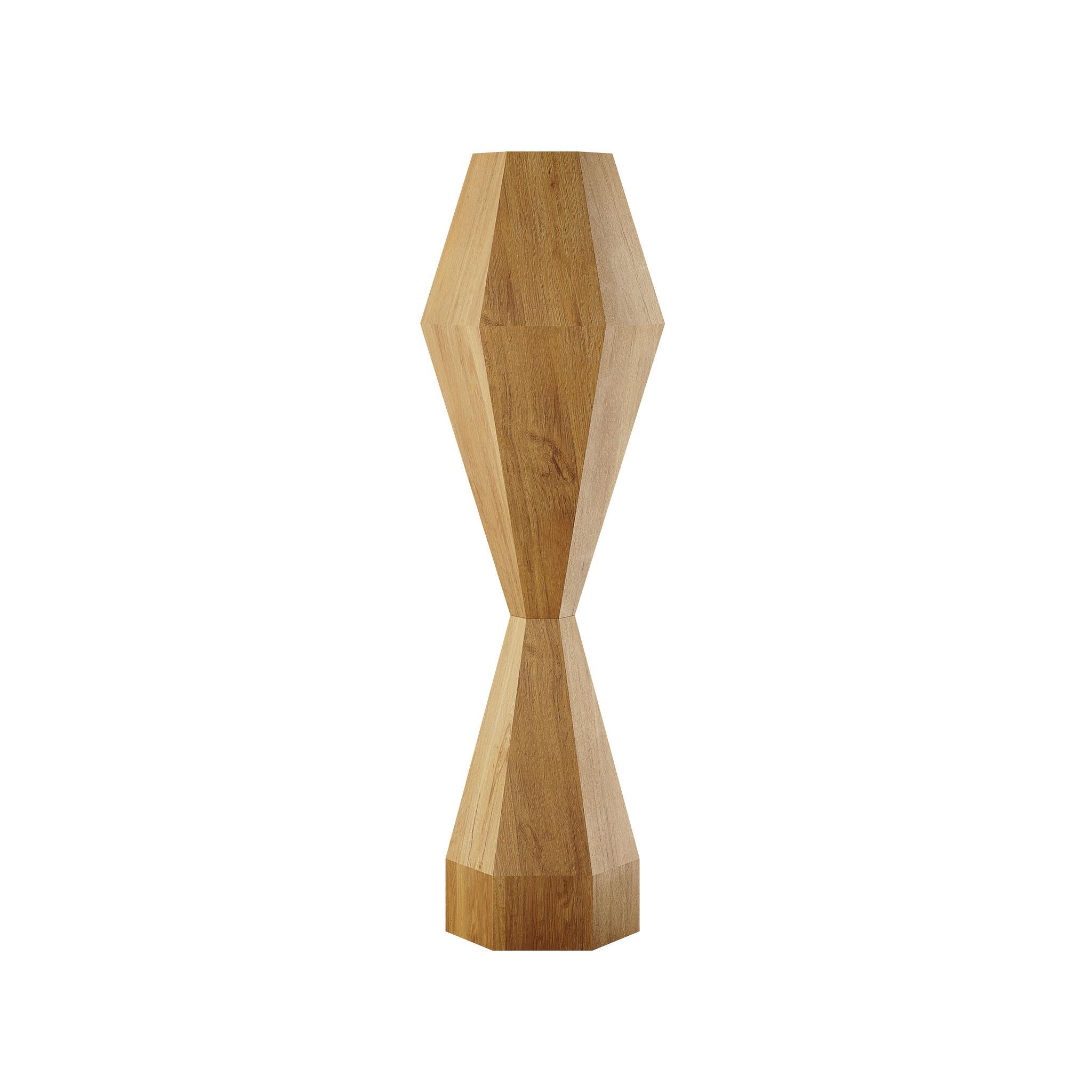 Introduce a unique and contemporary piece into your decor with our Contemporary Faceted Totem in Oak Wood Veneer, an expression of the 21st century, meticulously hand-carved and handcrafted. This totem is not just a decorative object but a