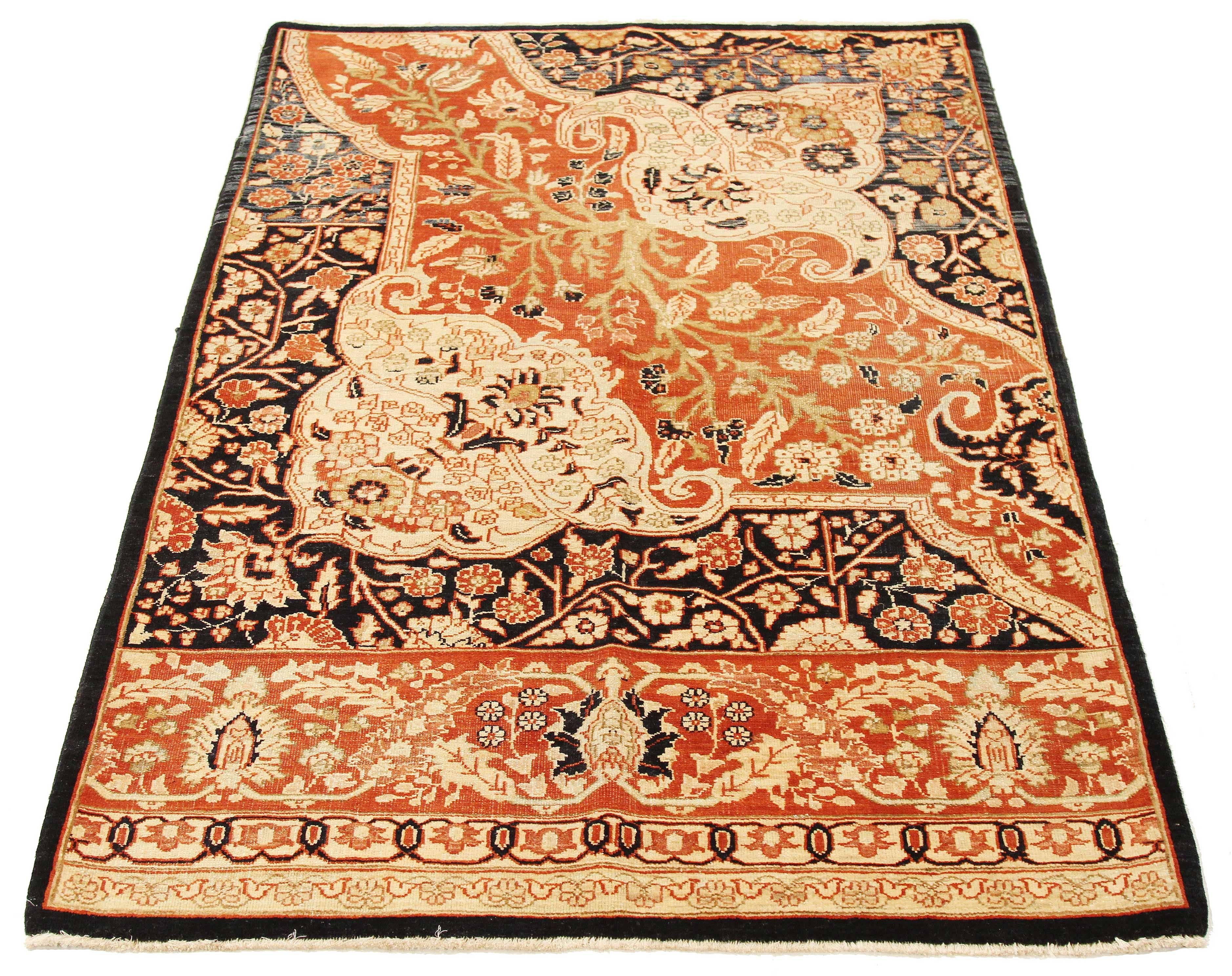 Contemporary Turkish rug handwoven from the finest sheep’s wool and colored with all-natural vegetable dyes that are safe for humans and pets. It’s styled after traditional Farahan weaving featuring a lovely ensemble of floral designs in black and