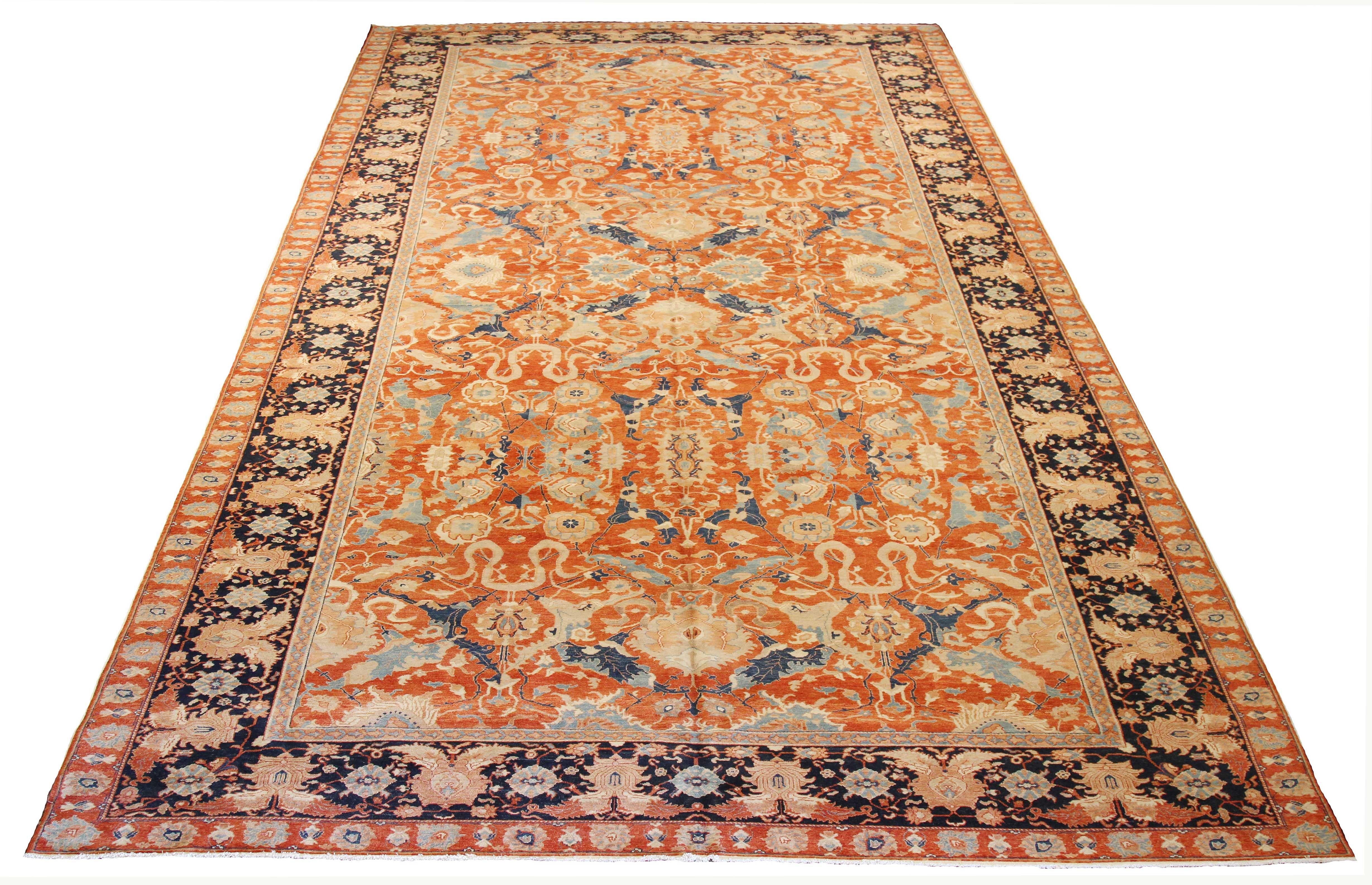 Contemporary Turkish rug handwoven from the finest sheep’s wool and colored with all-natural vegetable dyes that are safe for humans and pets. It’s a traditional Farahan weaving featuring a lovely ensemble of floral designs in navy and gray over a