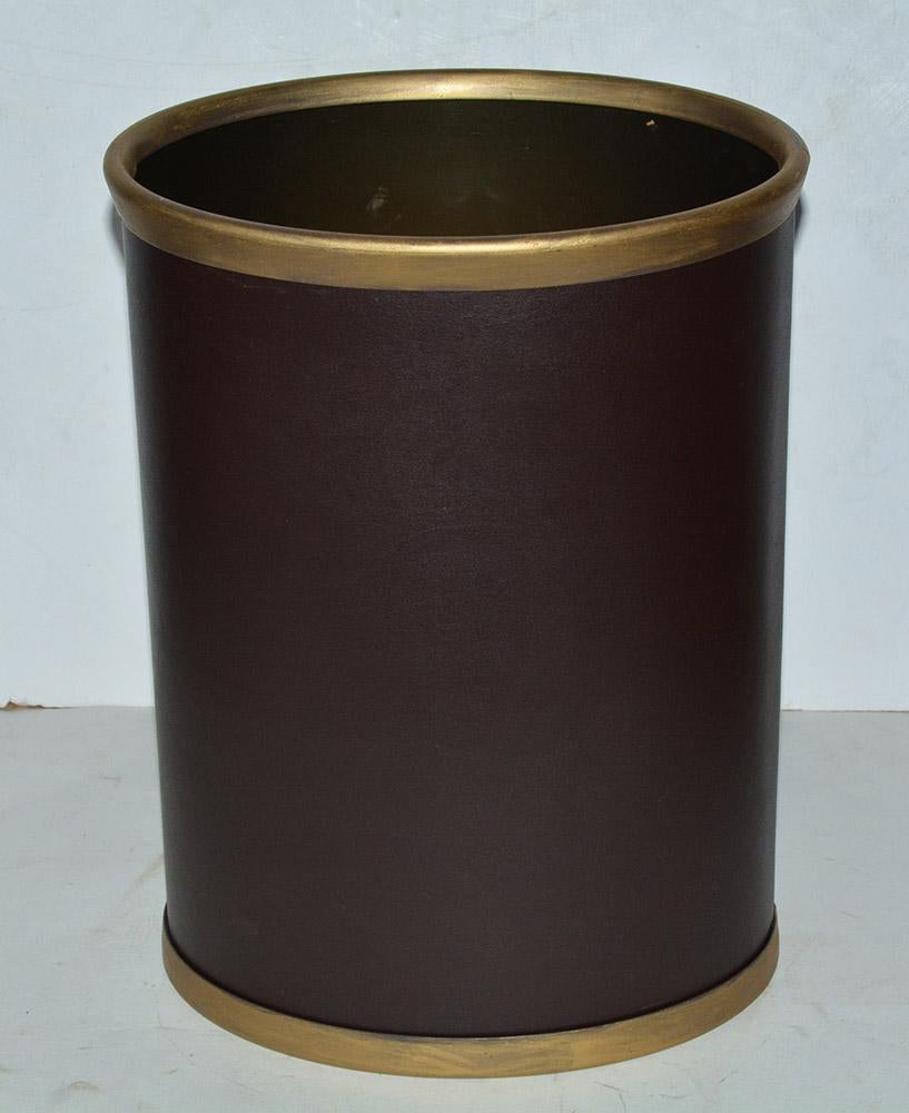 Stylish and practical at the same time. The brown faux leather can easily be cleaned and wiped down. Interior metal is also easy to maintain. The gold gilt edging gives it a Classic vintage/antique feel. Suitable for any decor -- modern, art deco,