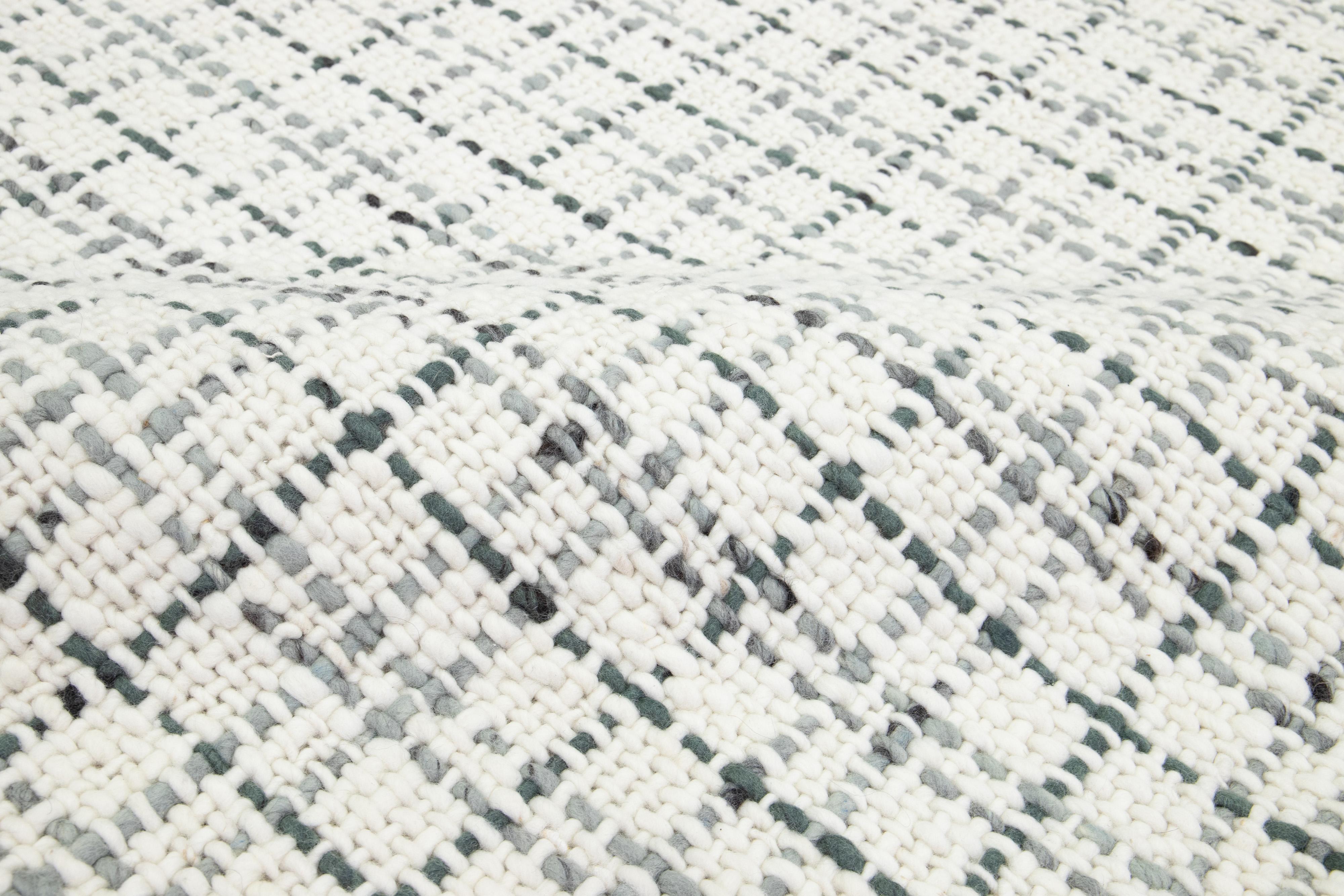Indian Contemporary Felted Handmade Wool Rug In Ivory and Gray by Apadana For Sale