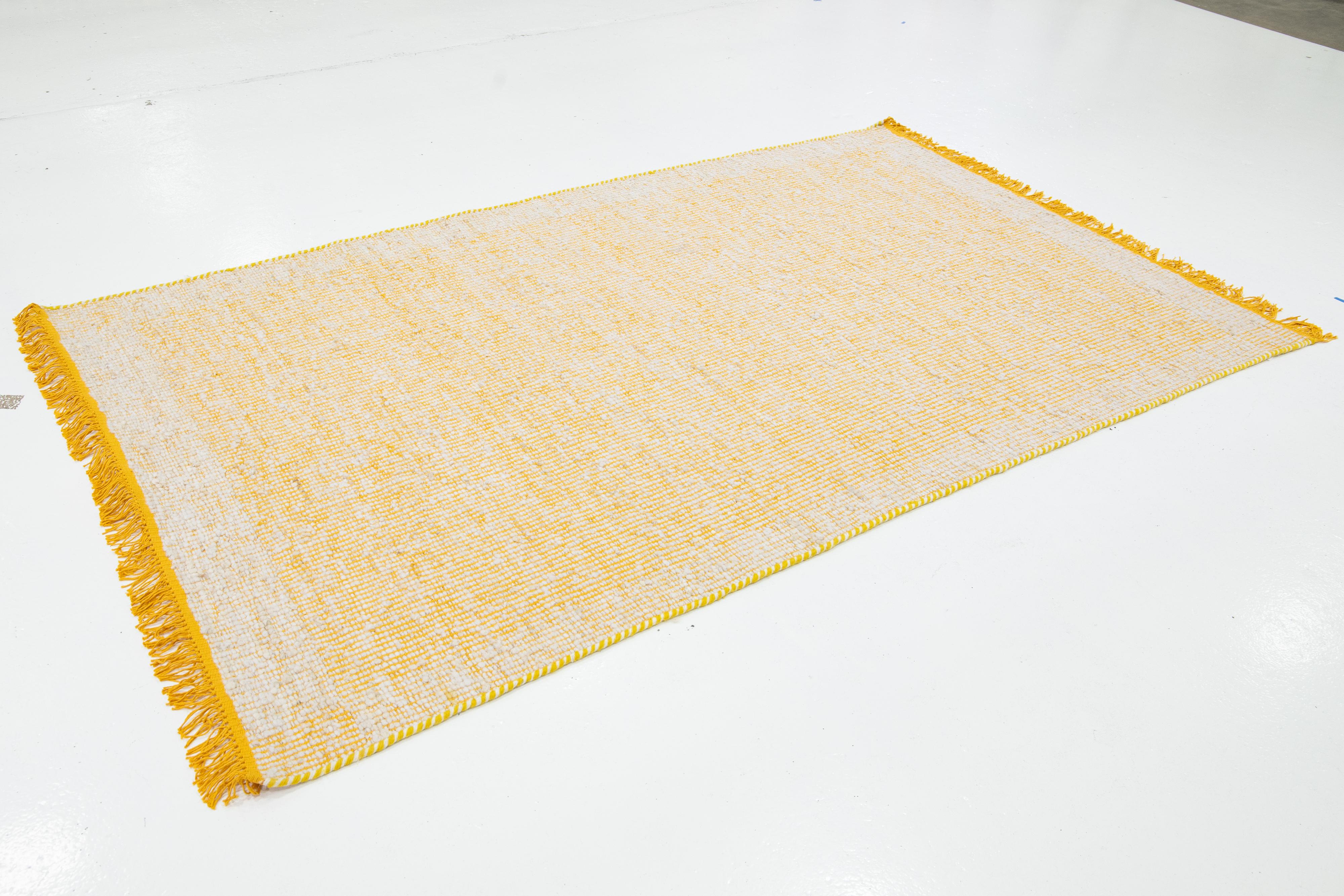 Indian Contemporary Felted Handmade Wool Rug In Yellow and Ivory by Apadana For Sale