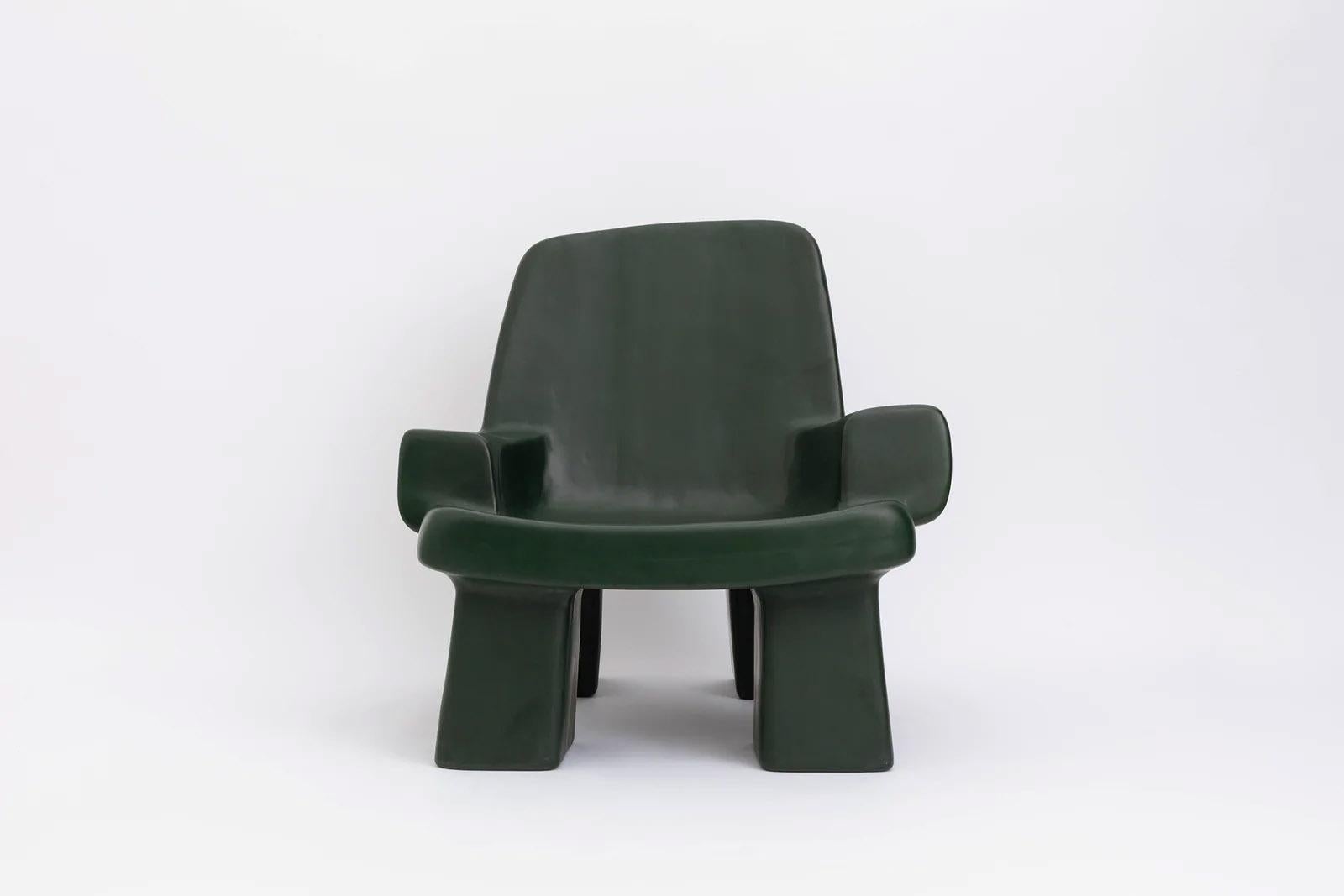 Contemporary fiberglass armchair - Fudge chair by Faye Toogood. This is shown in the malachite fiberglass finish. 
Design: Faye Toogood
Material: Fiberglass 
Available also in charcoal, cream or malachite opaque finish

Faye Toogood’s new Fudge