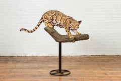 Contemporary Fiberglass Leopard Sculpture Mounted on a Tree Base