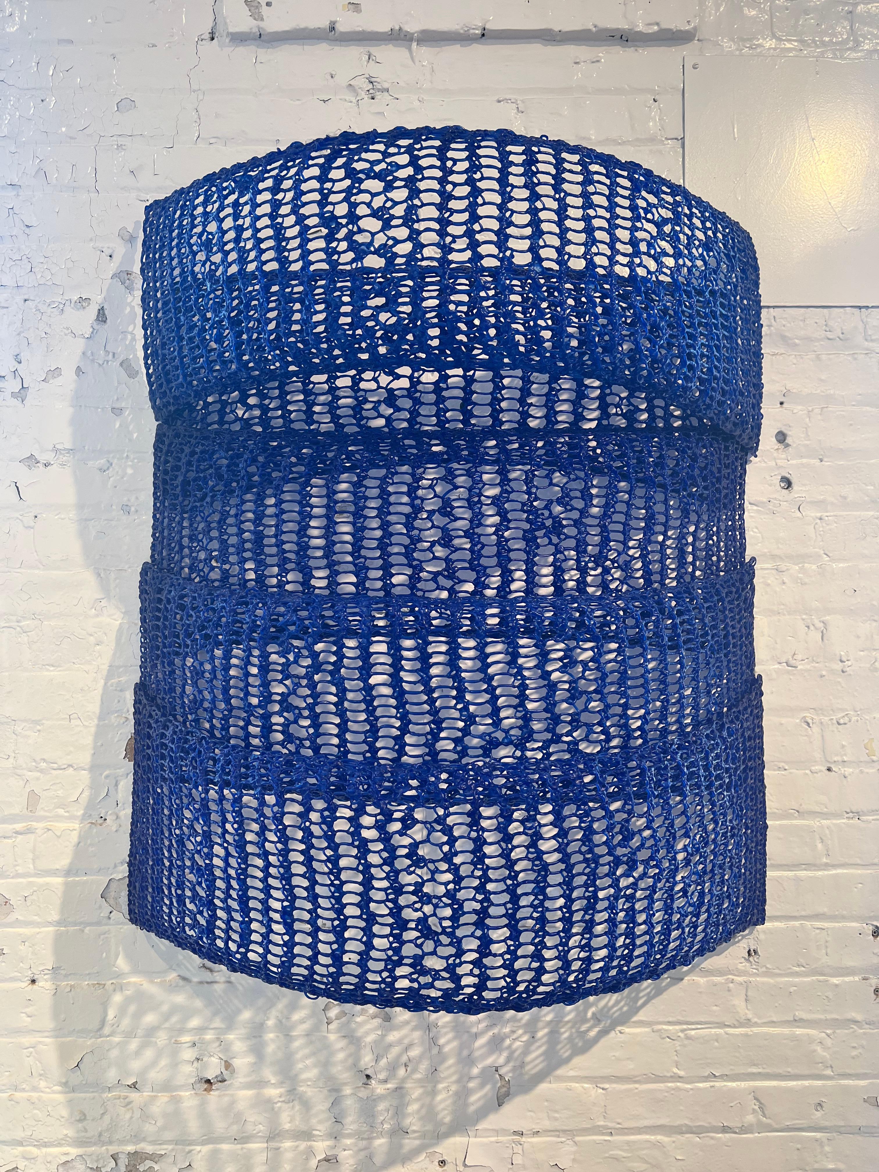 Contemporary hand crocheted fiberglass with polyester resin wall sculpture by Yvette Kaiser Smith.