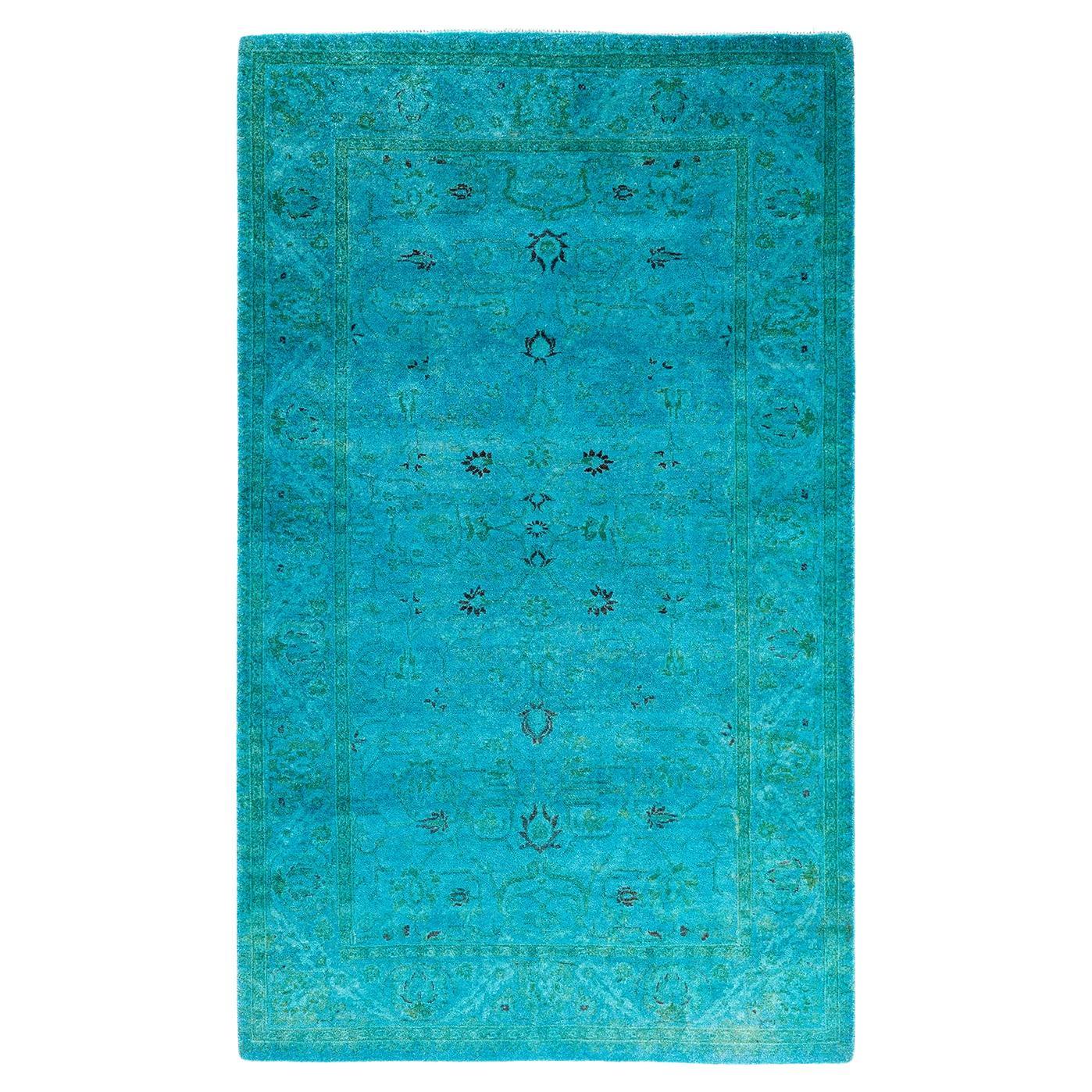 Alfombra contemporánea de lana anudada a mano de color azul vibrante