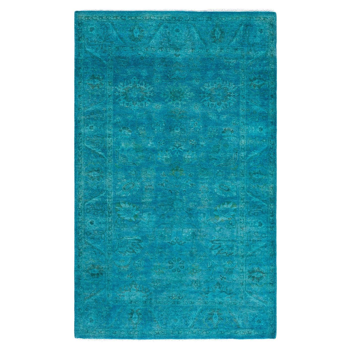 Alfombra contemporánea de lana anudada a mano de color azul vibrante