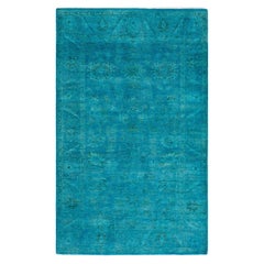 Alfombra contemporánea de lana anudada a mano de color azul vibrante