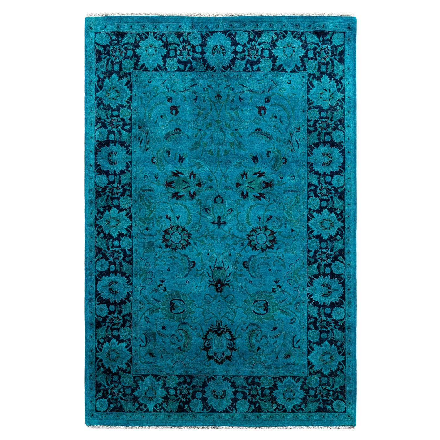 Alfombra contemporánea de lana anudada a mano de color azul vibrante