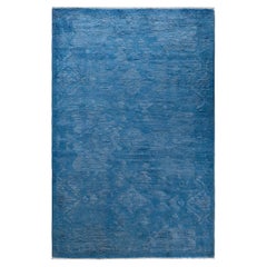 Alfombra contemporánea de lana anudada a mano de color azul vibrante