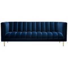 Contemporary Channeled Fleure 3 seater Sofa in Denim Blue Velvet and Brass Legs.