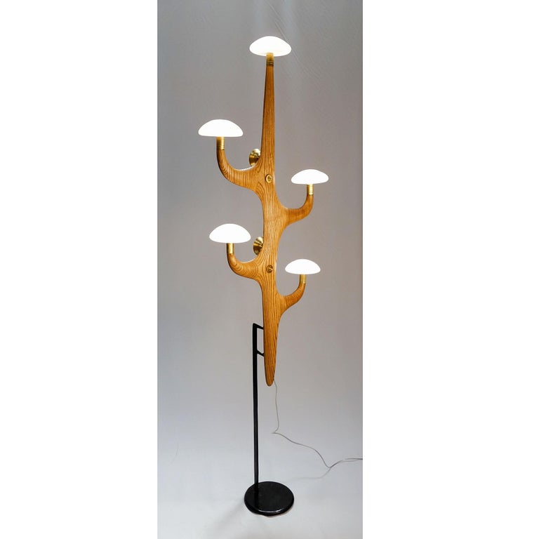 Japanese Tree is a an elegant floor lamp reminding a vegetal shape with 2 kinds of independent lighting.
1) Direct. 5 blown glasses within 2W LED bipin
2) Indirect, against the wall. 2X 6W LED bulbs Gu-10 warm light
The body is hand carved in ash