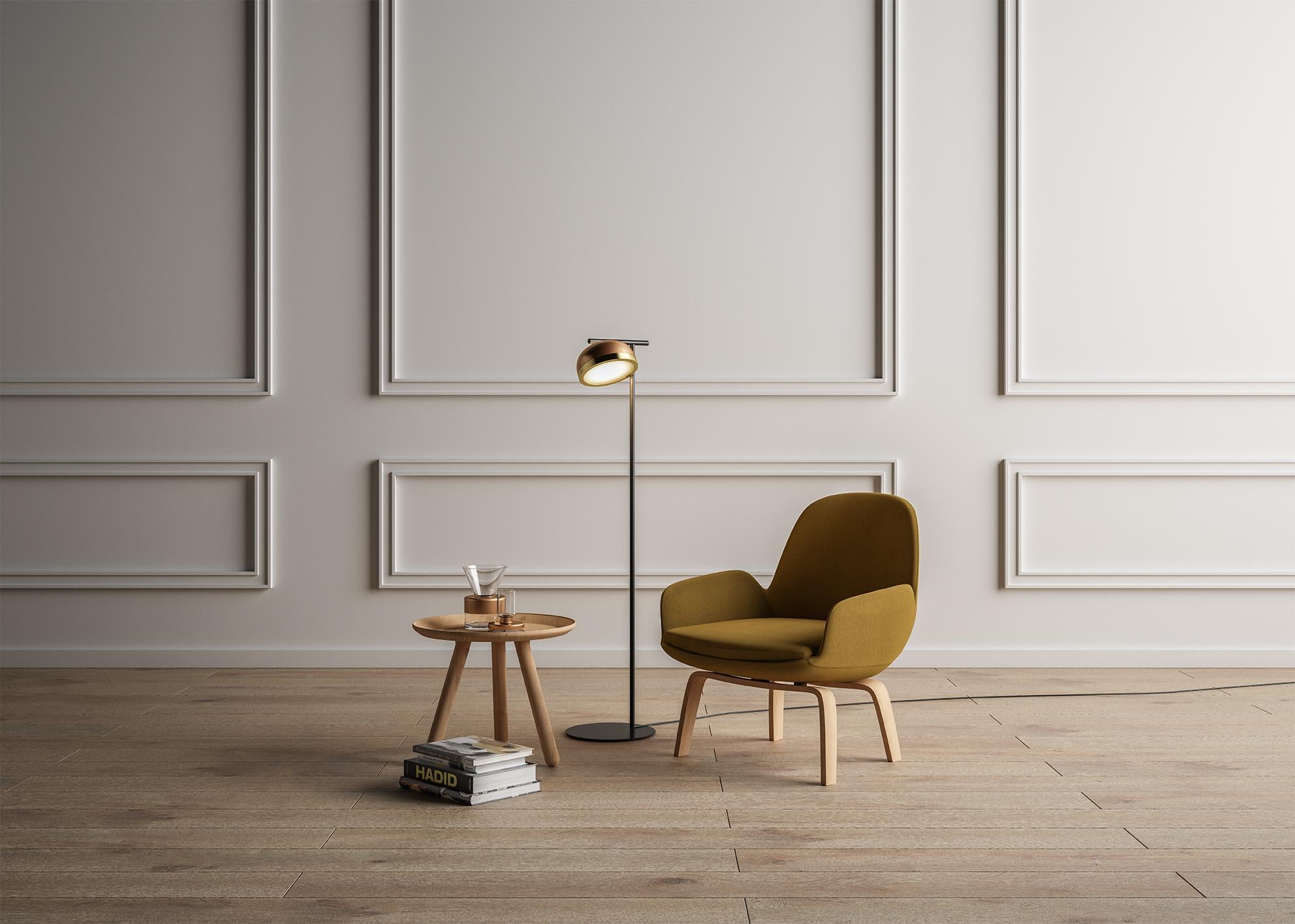 Floor Lamp Molly 556.62 by TOOY
Designer: Corrado Dotti

Model shown: Metal Dome C74 + Brushed brass Ring
Dimensions: H. 130 x D. 20 cm
Source light: 1 x LED 220/240V , 1200 lumens,  12W Compliant with USA electric system
Adjustable direct light