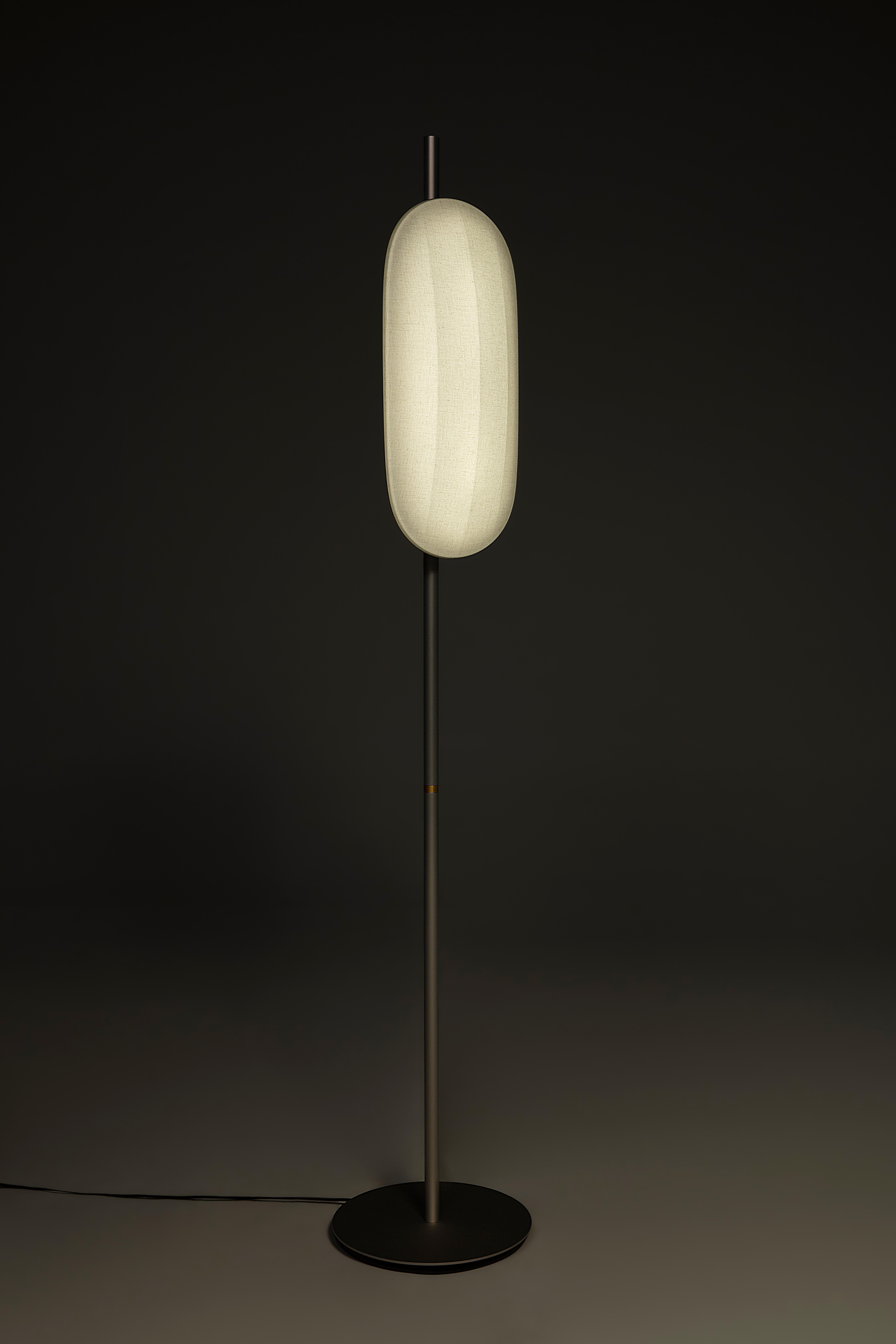 Voyage Floor Lamp by Bymars x AGO Lighting
Silver

Materials: Aluminum, Cotton fabric, PMMA 
Light Source: Integrated LED (SMD), DC
Watt. 10 W 
Color temp. 2700 / 3000K
Cable Length: 2.8 m 

Dimensions:
H. 172 cm x D. 32 cm 

VOYAGE the