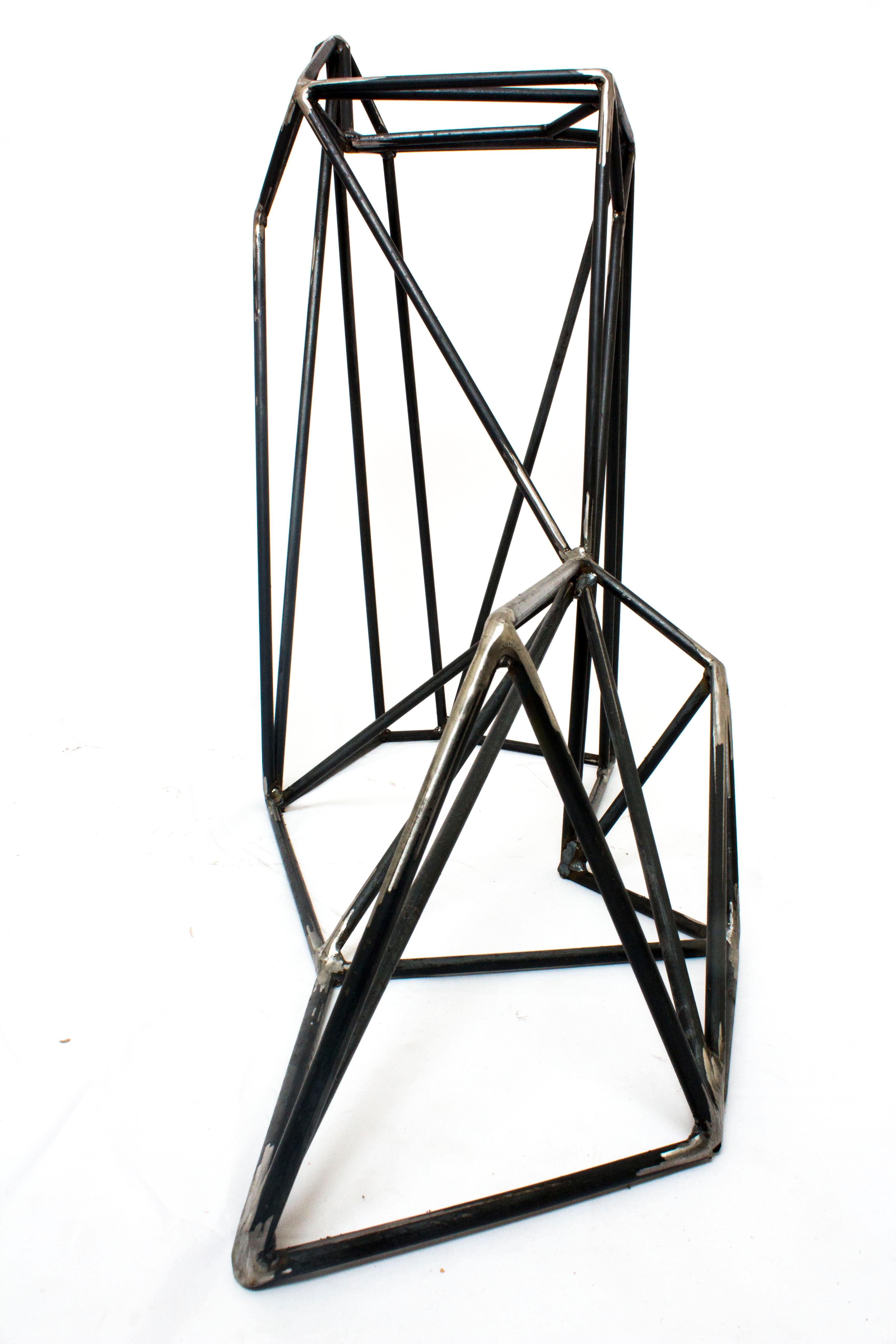 A contemporary polygonal sculpture that can be placed indoors or outdoors in multiple configurations. Fully customizable in terms of materials, finishes, and dimensions.

Overall dimensions as shown are 36