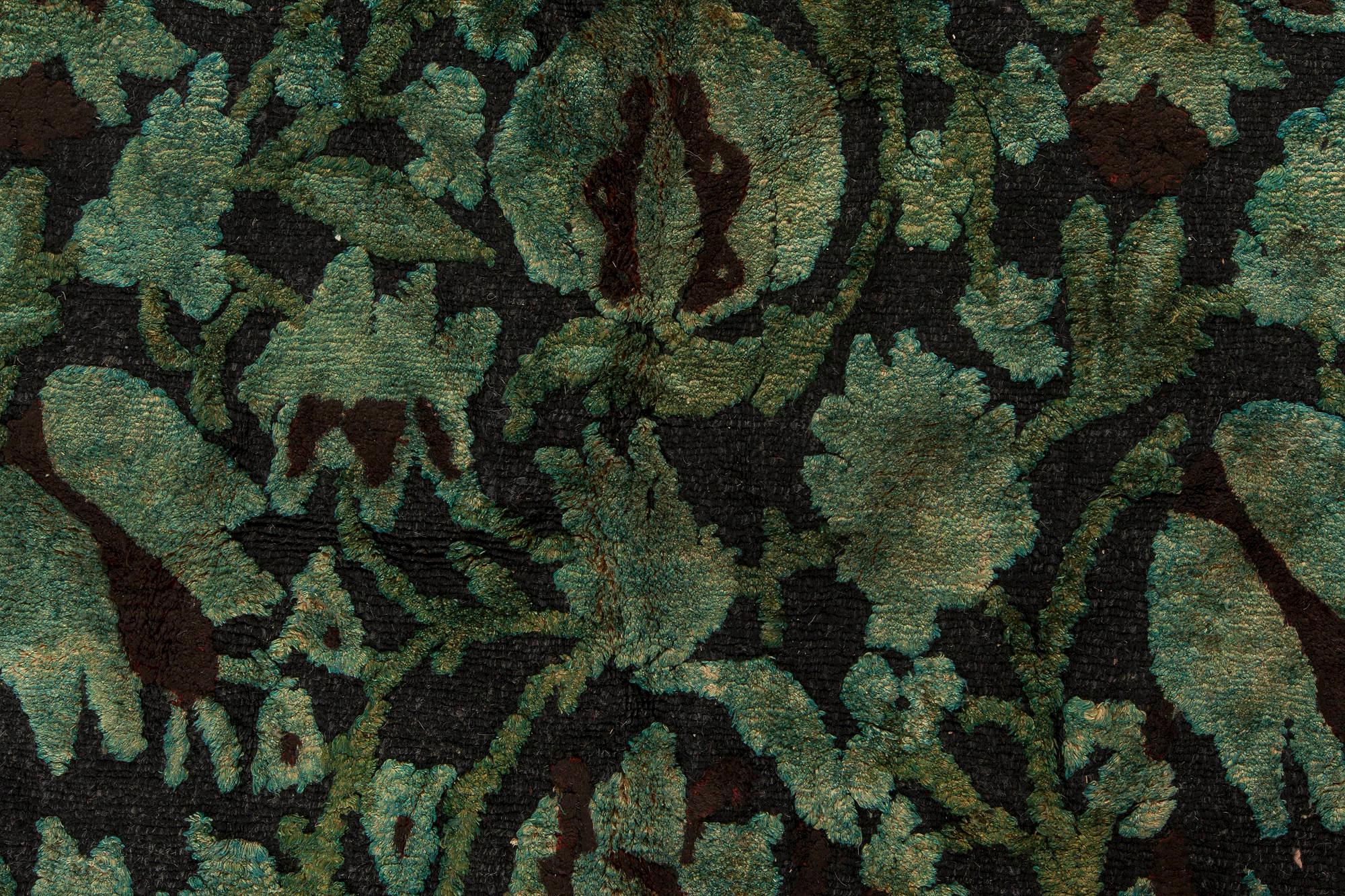 Contemporary floral green and black European inspired Tibetan rug by Doris Leslie Blau.
Size: 7'10