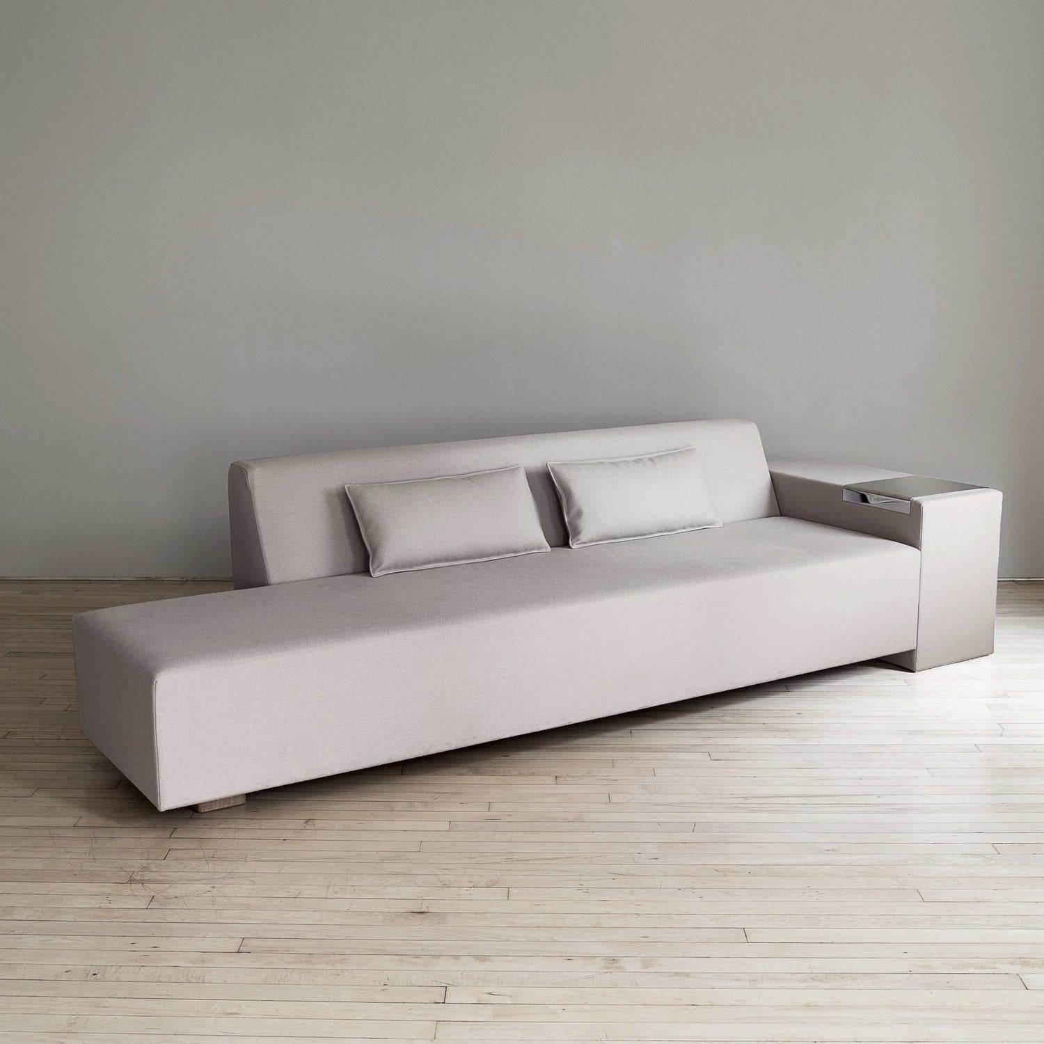 Created by Angie Anakis for the Editions Domeau & Pérès, the Sidigi Sofa is hand crafted at the atelier in Paris with high resilience foam structure available in three different density - firm, medium, or soft options. The model is available in