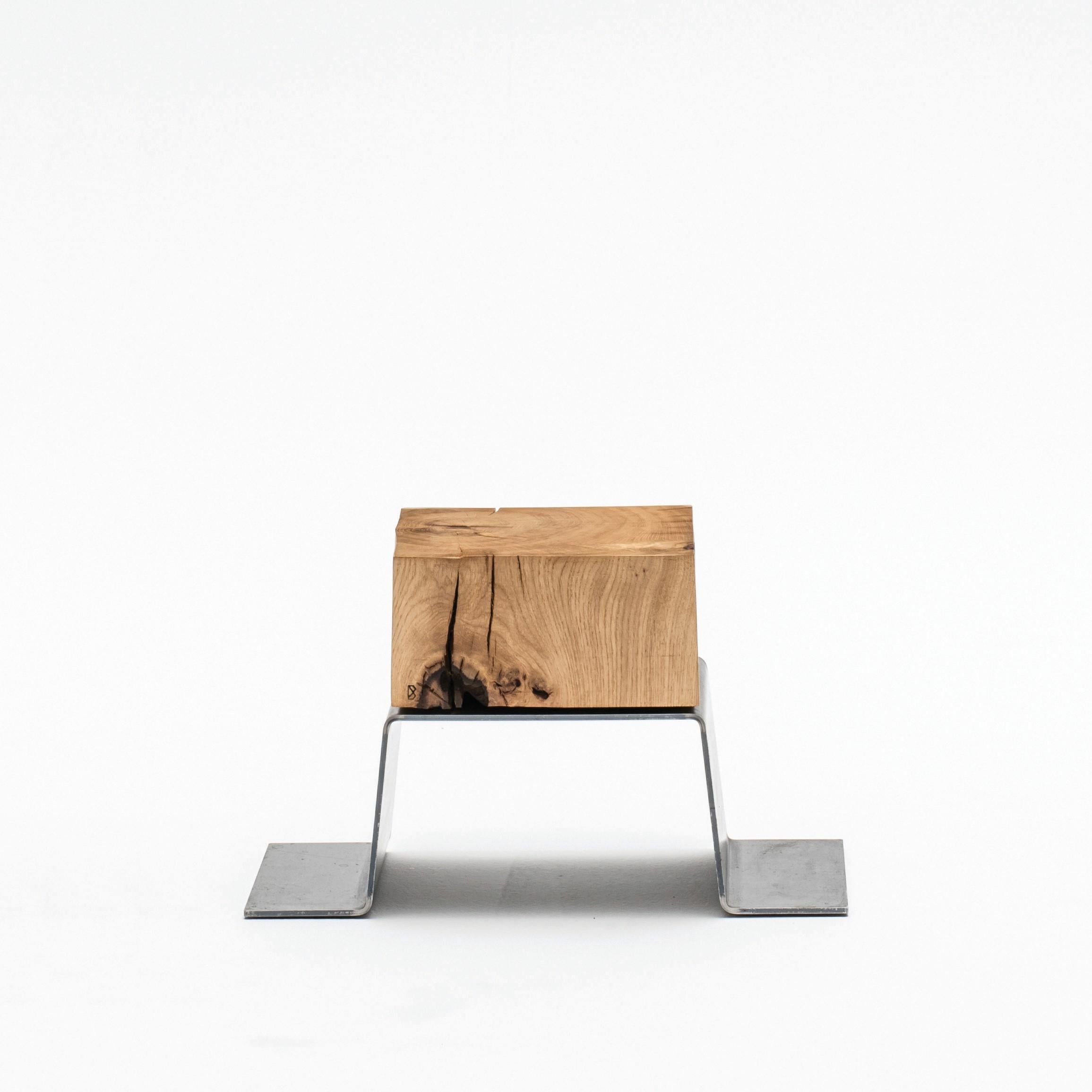 THE LINE Foot Stool is beautifuly simple but perfectly designed for stretching your legs out and putting your feet up.

It is the reversed V-shaped stool made of the combination of the 200/300-year-old oak and the raw steel. The oak is drummed up