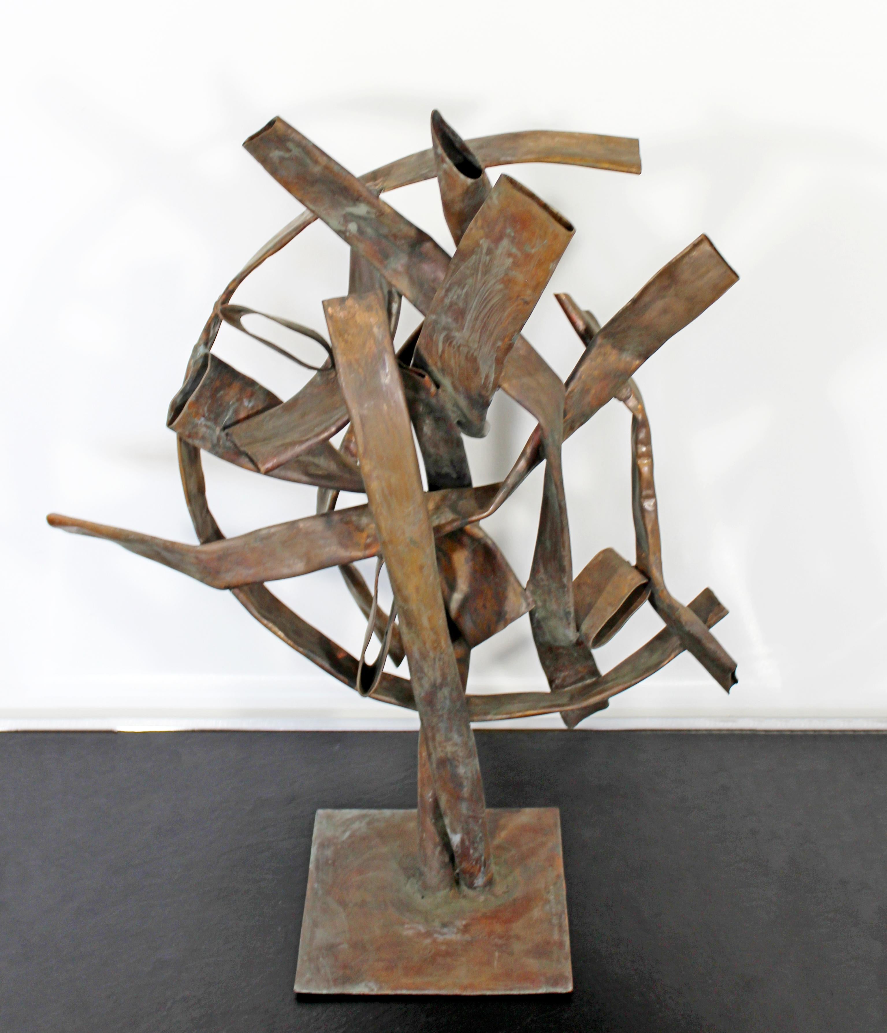 For your consideration is a beautiful, forged copper metal, abstract table sculpture, signed by Robert D. Hansen, dated 2016. In excellent condition. The dimensions are 19
